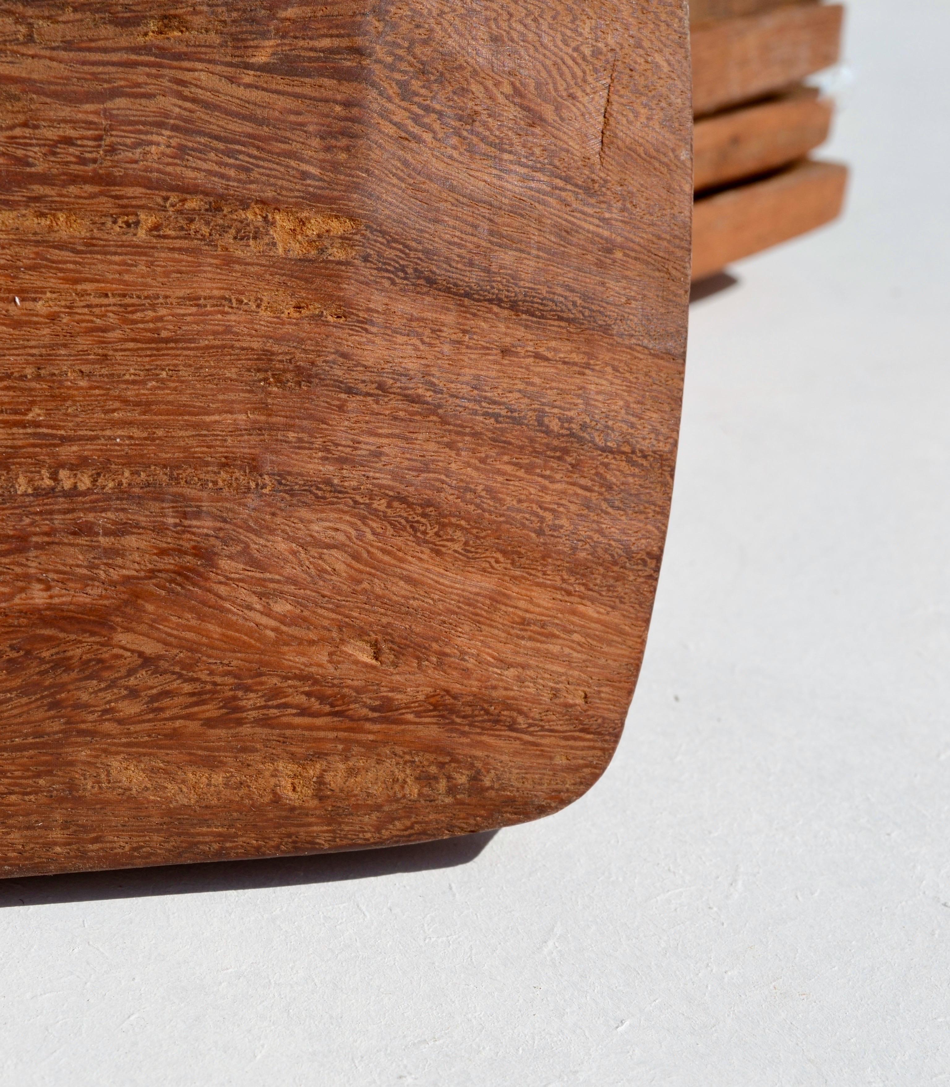 Rare Set of Ten Hand-Carved Palmwood Square Plates with Serving Platter
France, 1970s

A beautiful and rare 1970s French set of hand-carved square plates in palmwood, accompanied by a larger coordinating serving platter. Each piece displays the