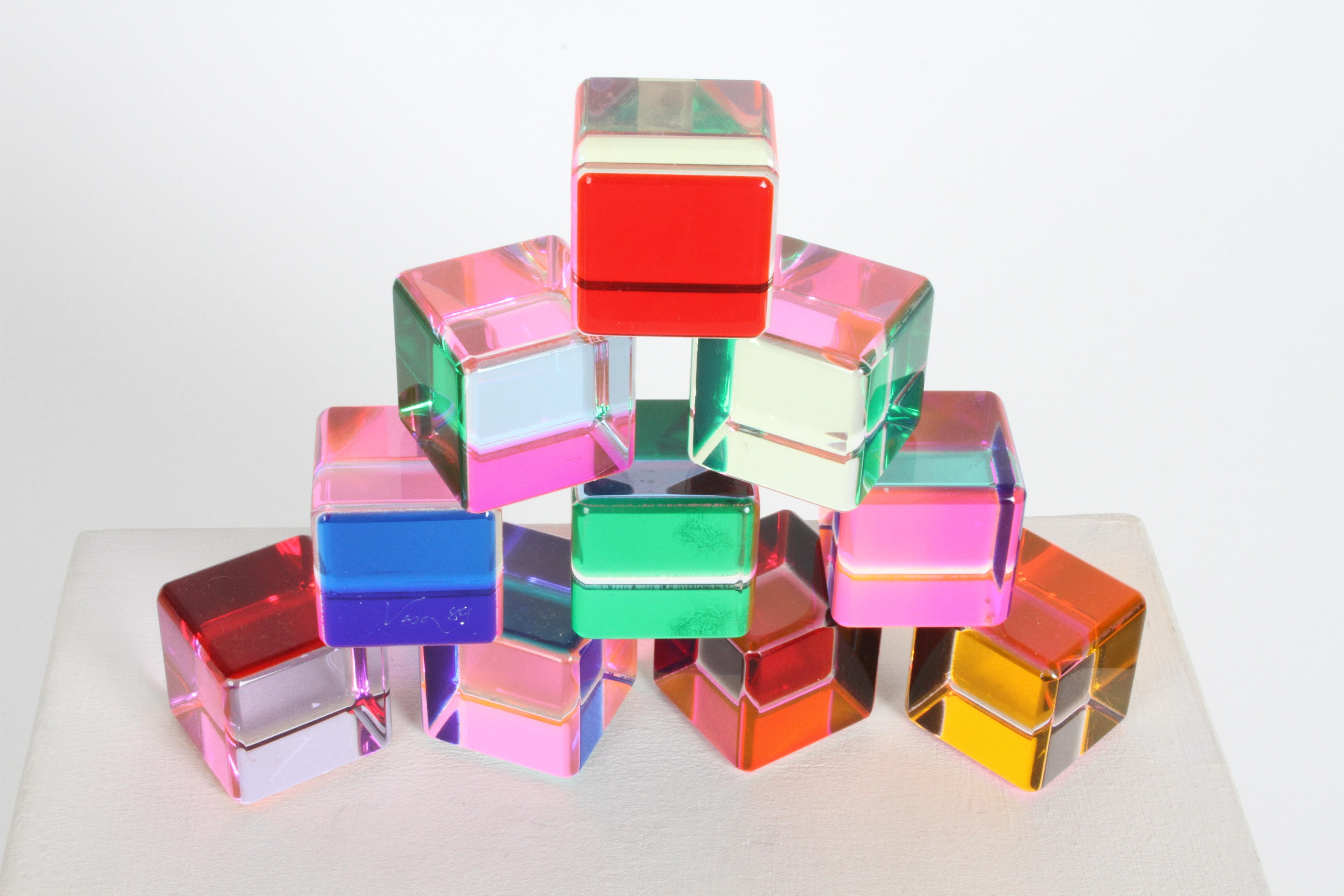 Faceted colorful Lucite set of ten Vasa Mihich cube sculptures, one is signed Vasa and dated '89. 2