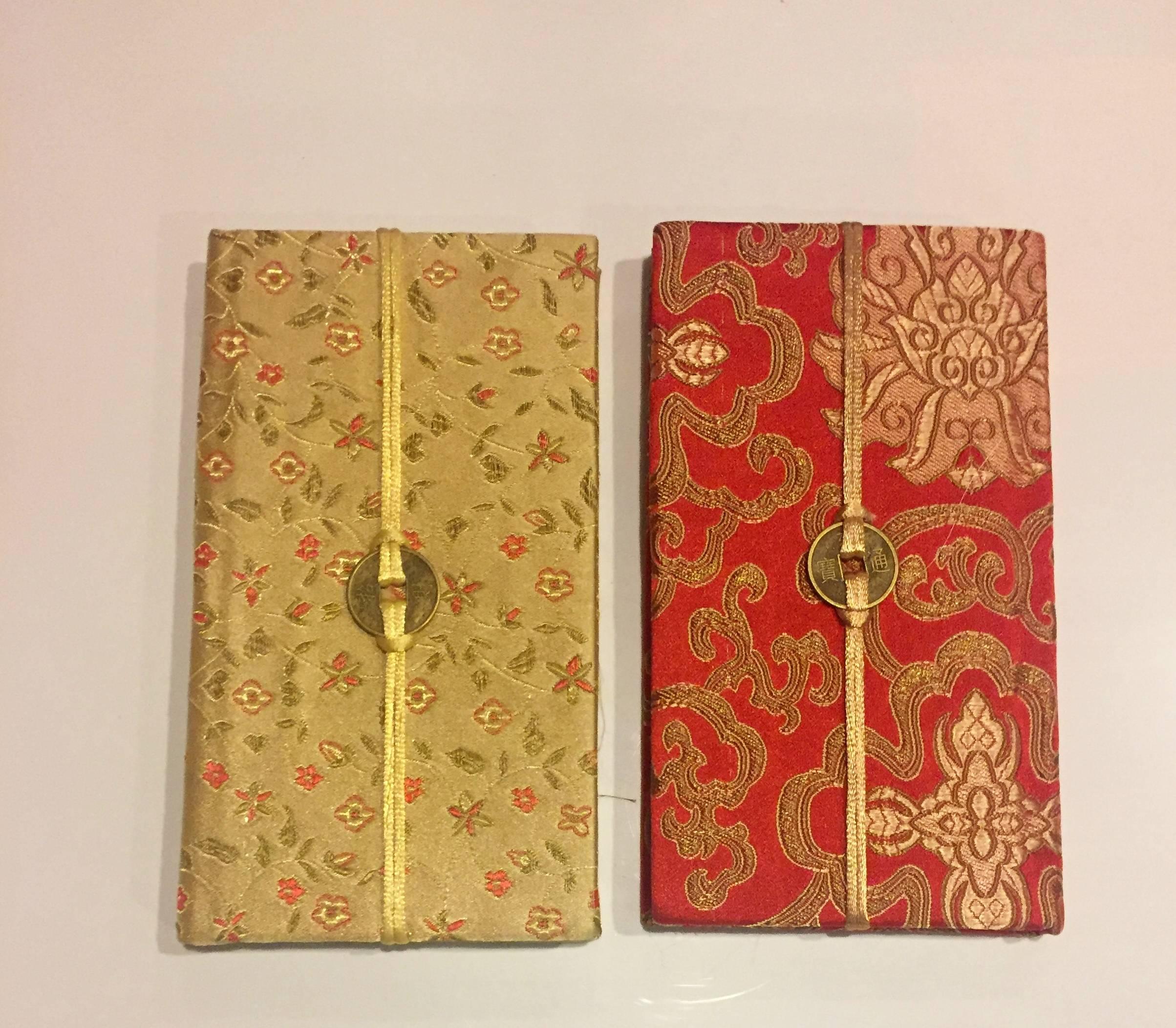 Beautiful set of ten journals covered in the most gorgeous Chinese silk brocade. The fabrics showcase a myriad of traditional, auspicious Chinese symbols, each expressing good wishes for life including good health, long life, happiness, prosperity,