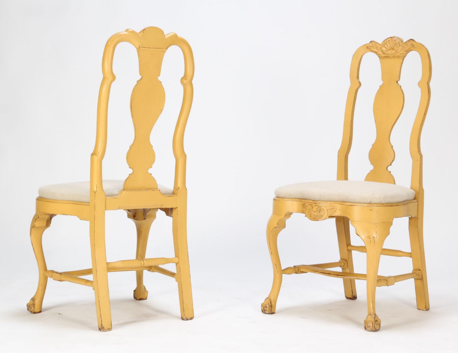 Beautiful set of 10 dining room chairs, Swedish, turn of 20th C, popular Queen Anne style in rococo form, in a beige/yellow paint, sturdy but elegant, seats in perfect condition in off-white fabric.