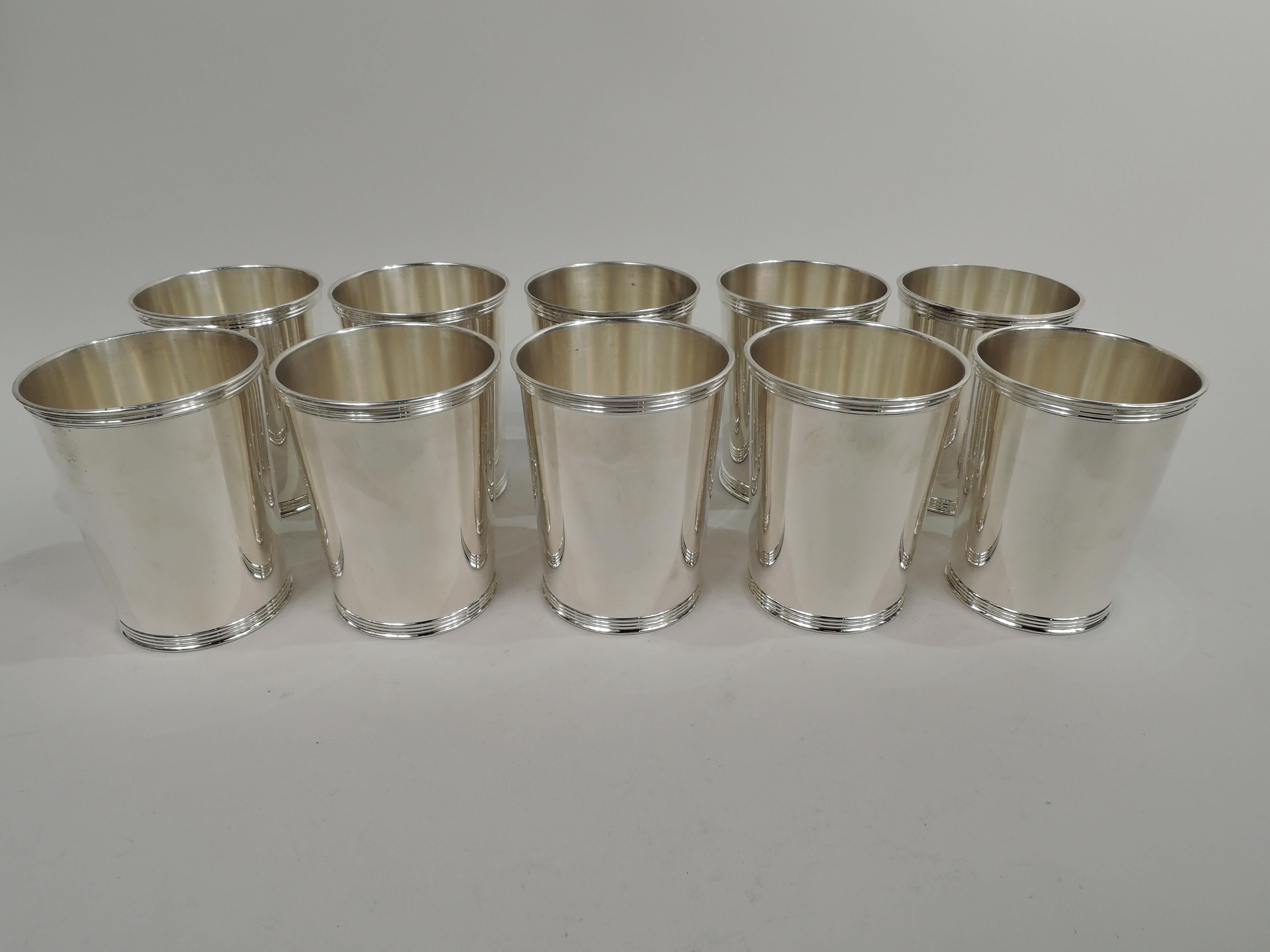 Ten sterling silver mint juleps. Made by Manchester in Providence. Each: Straight and tapering sides, and reeded rim and base. A great set to celebrate the return to real life face time. Fully marked including maker’s stamp and no. 3759. Total