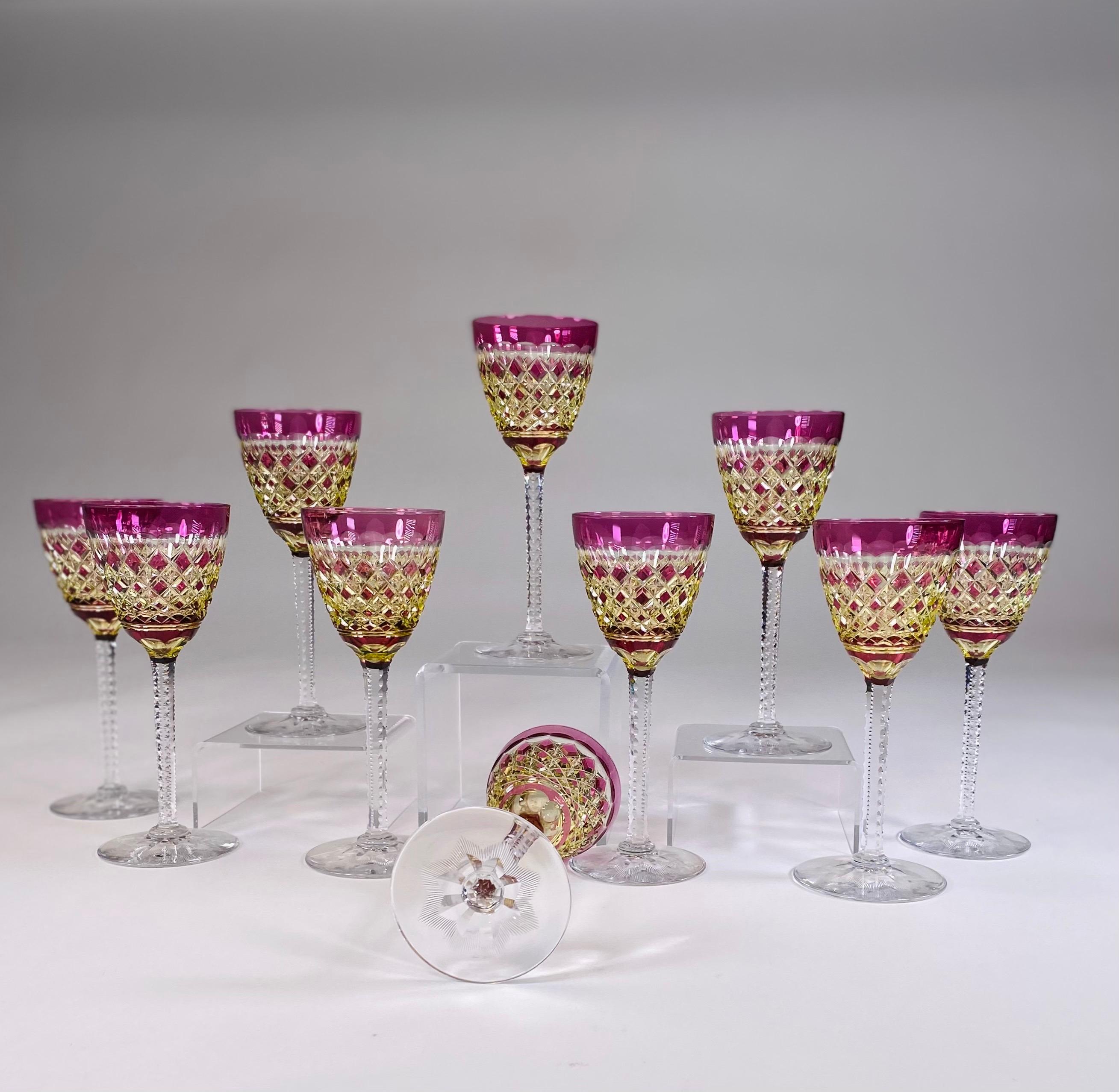This is a rare combination of Val St. Lambert's finest workmanship. The tall elegant goblets are handblown crystal with Amethyst overlay cut to Chartreuse, an uncommon combination. These will be the focal point of your backbar or display.
The stem