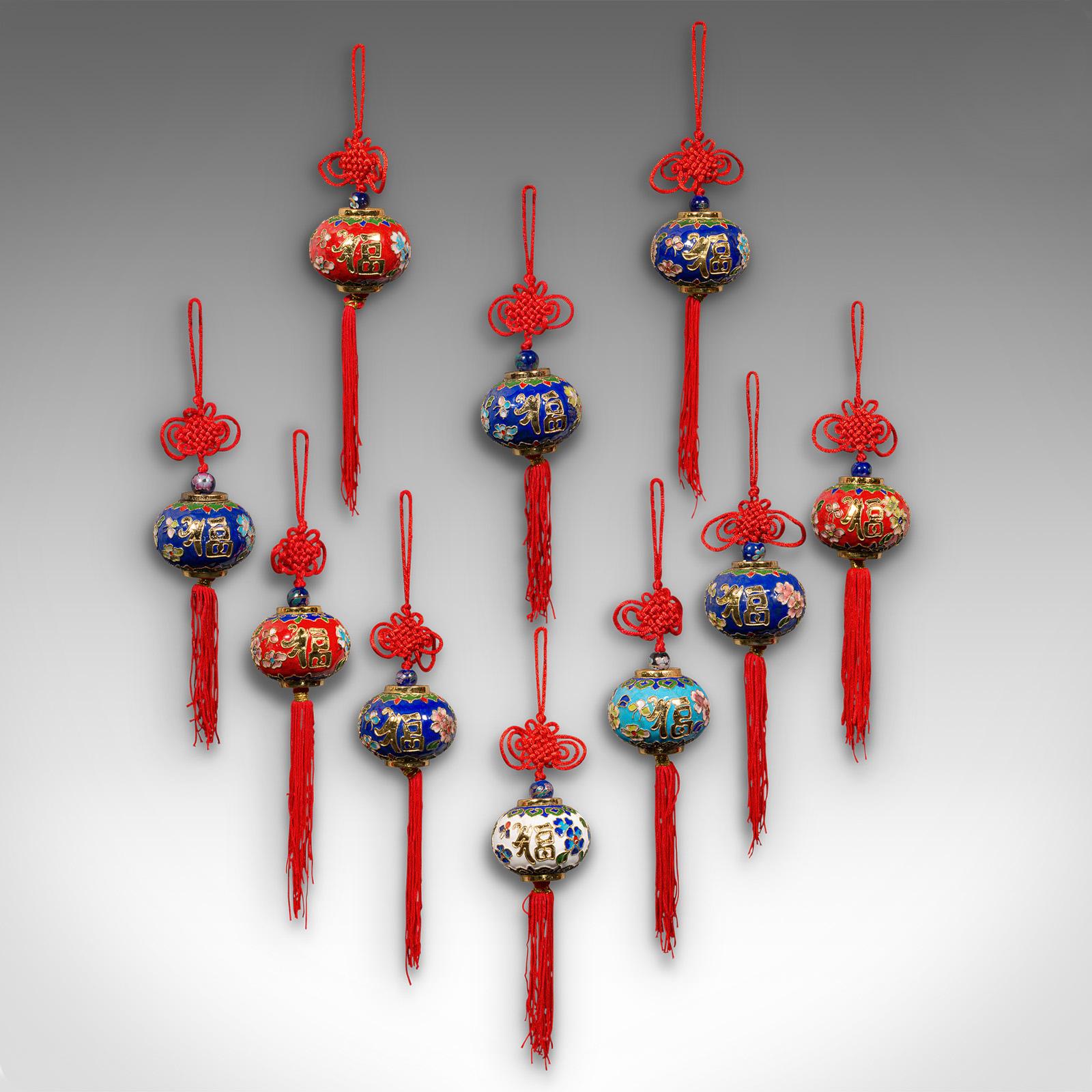 This is a set of 10 vintage festival lanterns. A Chinese, decorative tree bauble with Oriental motif, dating to the late 20th century, circa 1970.

Delightfully colourful, extravagant festival decor
Displays a desirable aged patina and in good
