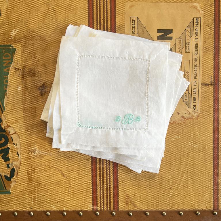 A set of 10 vintage white monogrammed cocktail napkins. This set is beautifully embroidered with the previous owner's monogram of BBB. 

Dimensions:
6