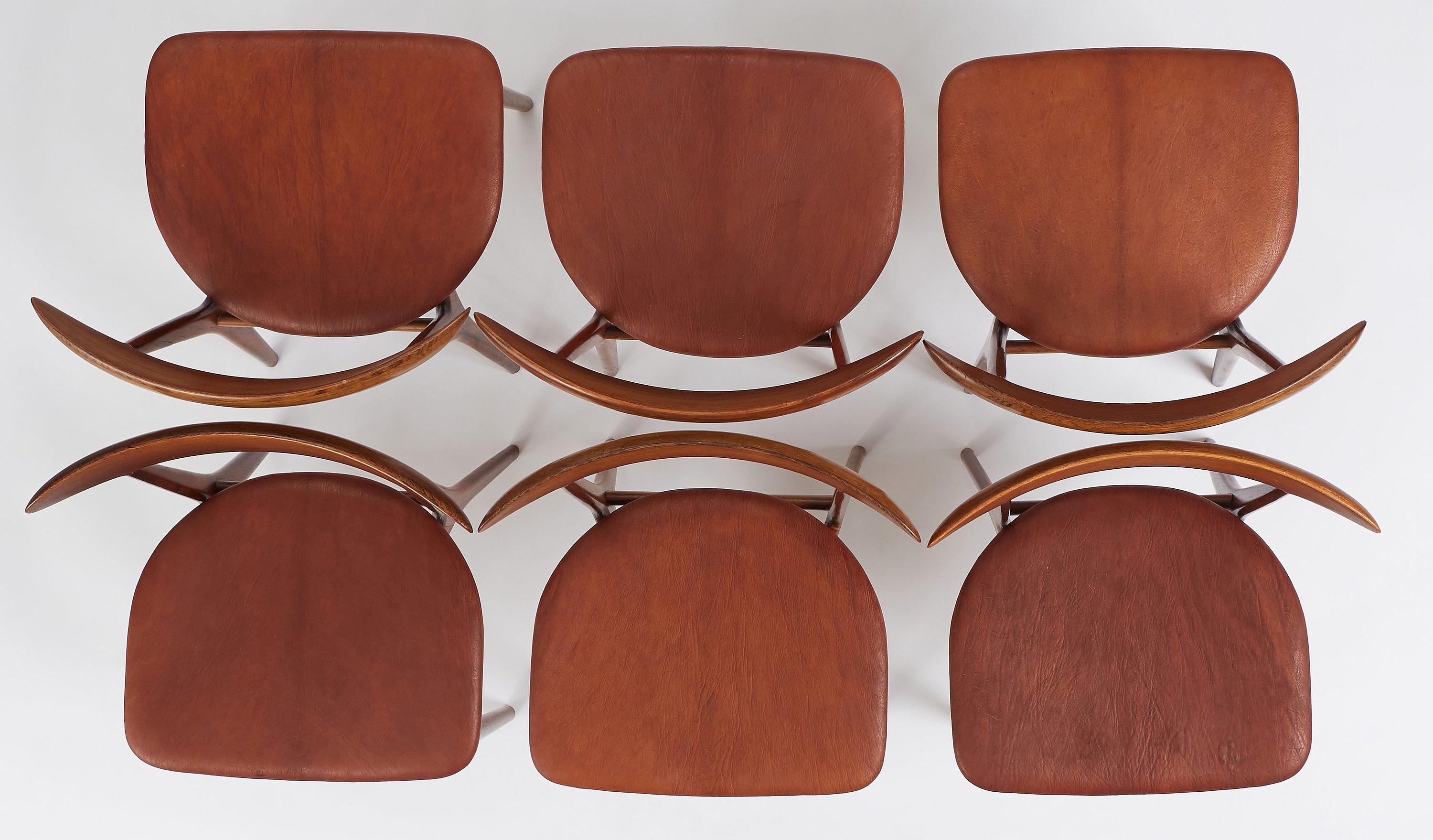 Goatskin Set of 10 ROSEWOOD and patinated niger leather dining chairs, by Kurt Østervig For Sale