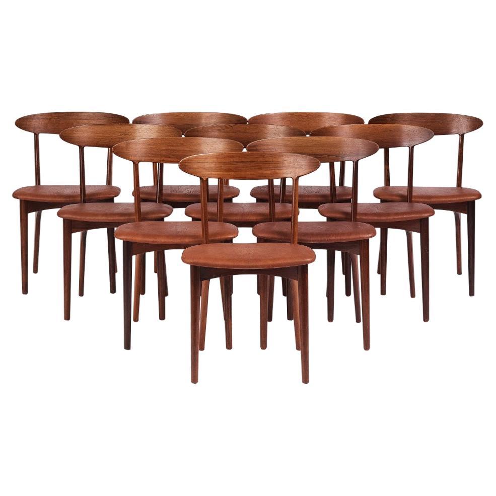 Ensemble de 10 chaises de salle à manger en bois de rose et cuir nigré patiné, par Kurt Østervig en vente