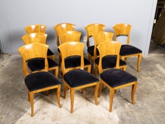 Juego de 10 sillas de comedor de nogal estilo Biedermeier, hacia 1920