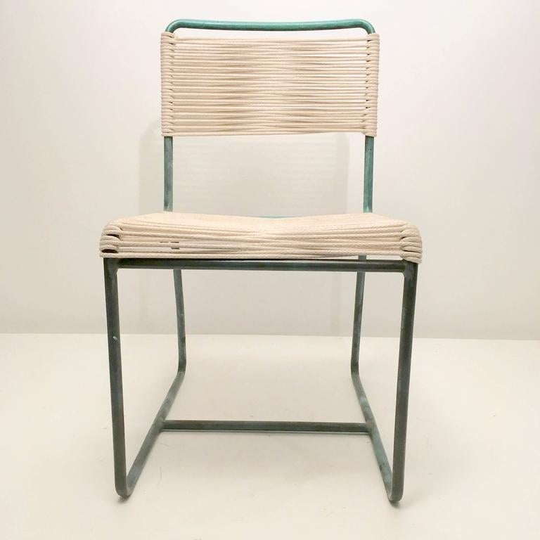 Set of 10 Walter Lamb Bronze Dining Chairs for Private Listing. Set includes 8 side chairs and 2 armchairs. 