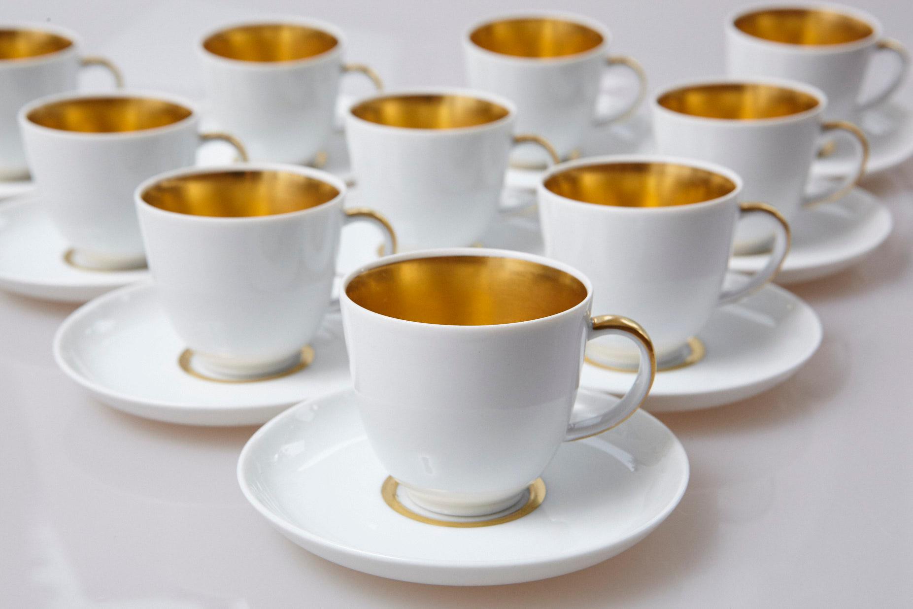 Beautiful set of ten white and 22-karat gold porcelain demitasse or mocca / espresso cups and saucers, with gold interior, gold handles and gold rimmed saucer, by Fürstenberg, Germany.
All stamped and numbered with the blue porcelain stamp F for