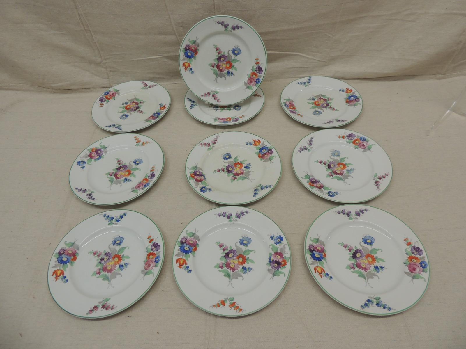 Set of (10) Wood & Sons floral porcelain dessert plates.
Floral bouquet in shades of blue, red, green, yellow and orange.
Size: 8