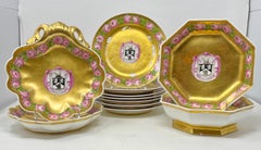 Set of 11 Antique 19th Century Gold Porcelain "Armorial" Plate and Shell Dishes.