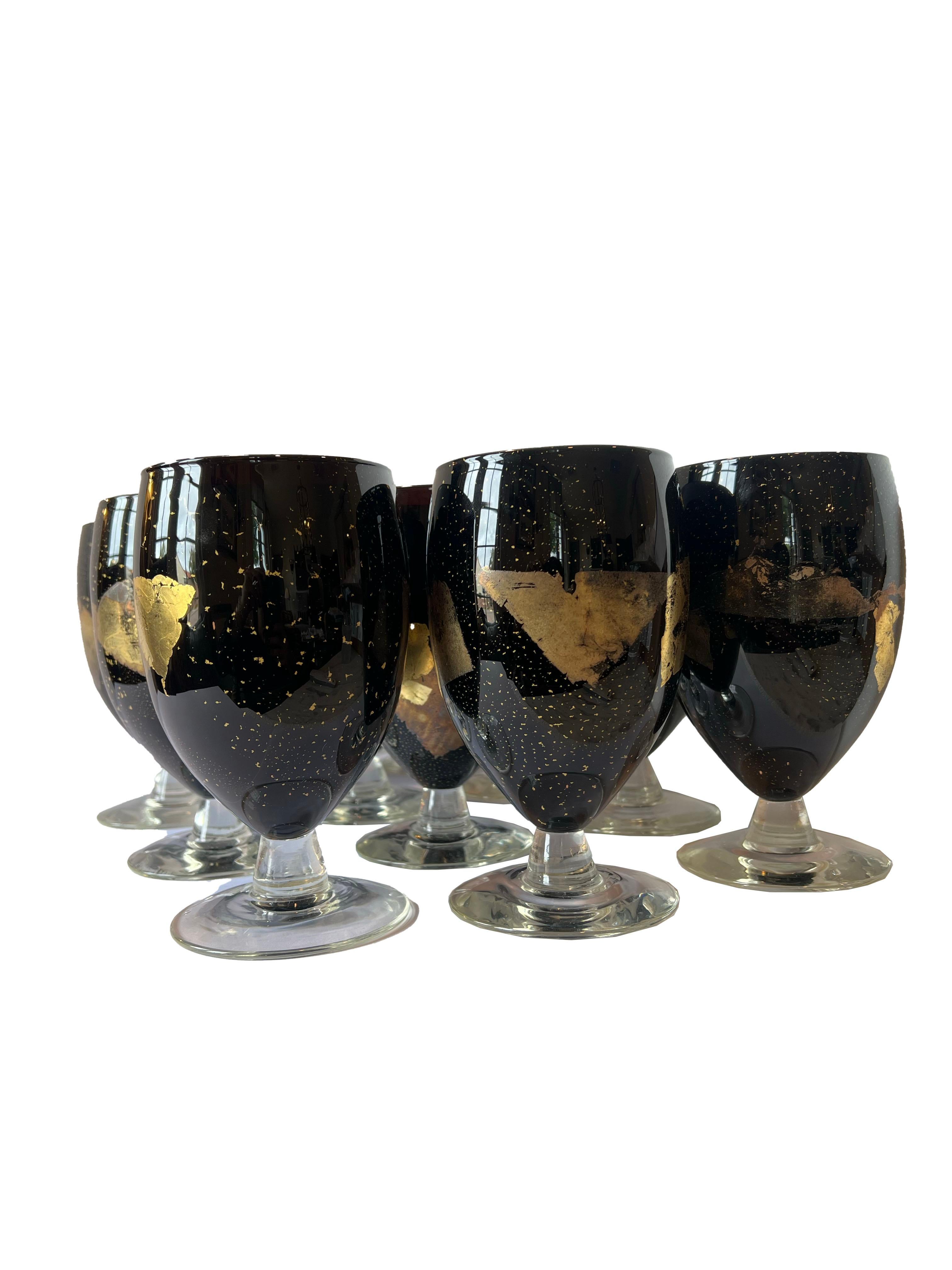 An exquisite set of eleven Randy Strong Goblets, each a masterpiece signed with etching on the base. These goblets, meticulously hand-blown, showcase the artistry of Randy Strong, a maestro in the world of glass craftsmanship. What makes this