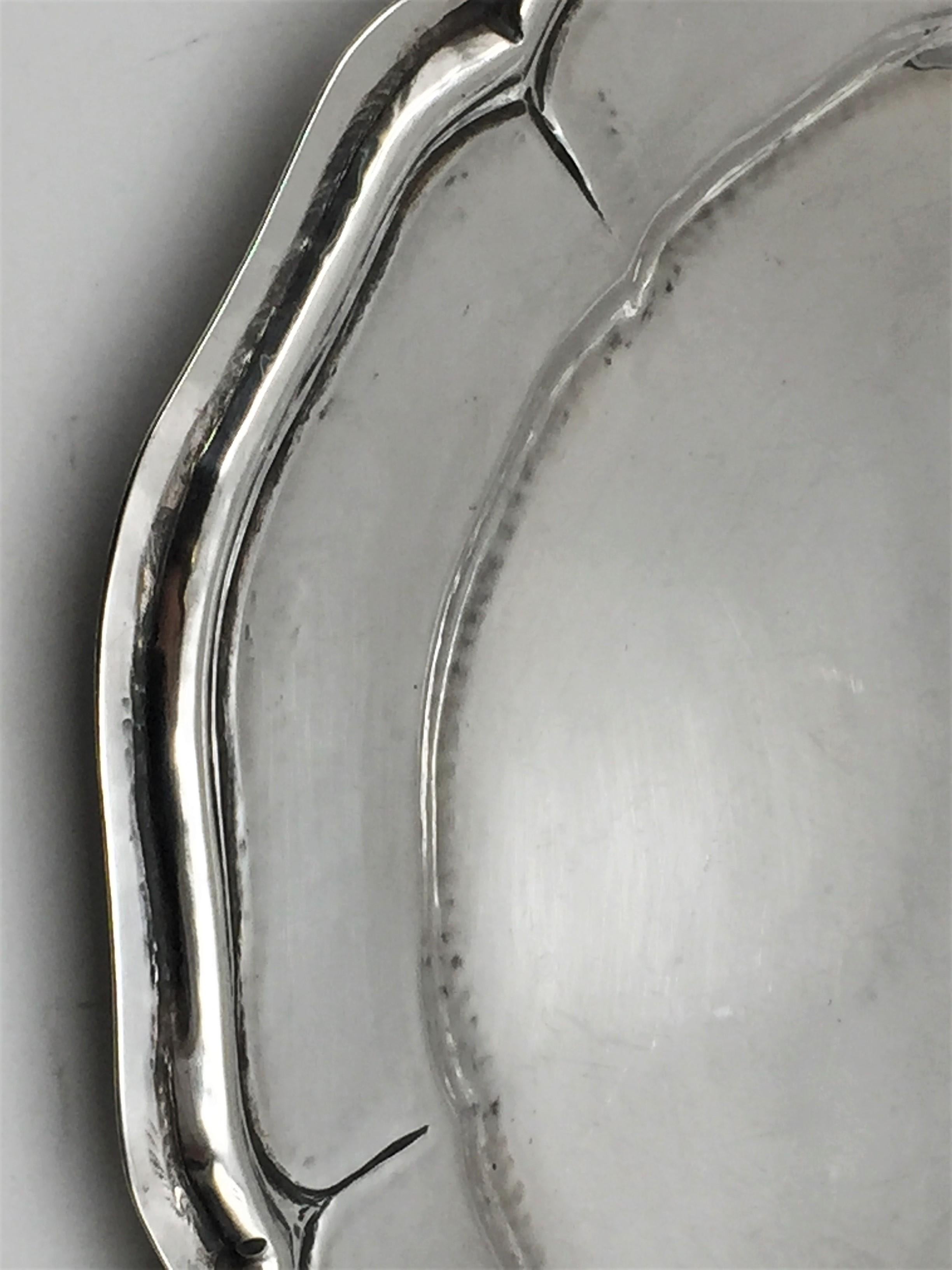 Beautiful set of 11 Buccellati sterling silver dessert plates with a wave shaped rim. Made in Italy. A great gift and addition to one's home and collection. Measuring 7 ½” in diameter by 1/3” in height and total weight is 58.6 ounces. Bearing