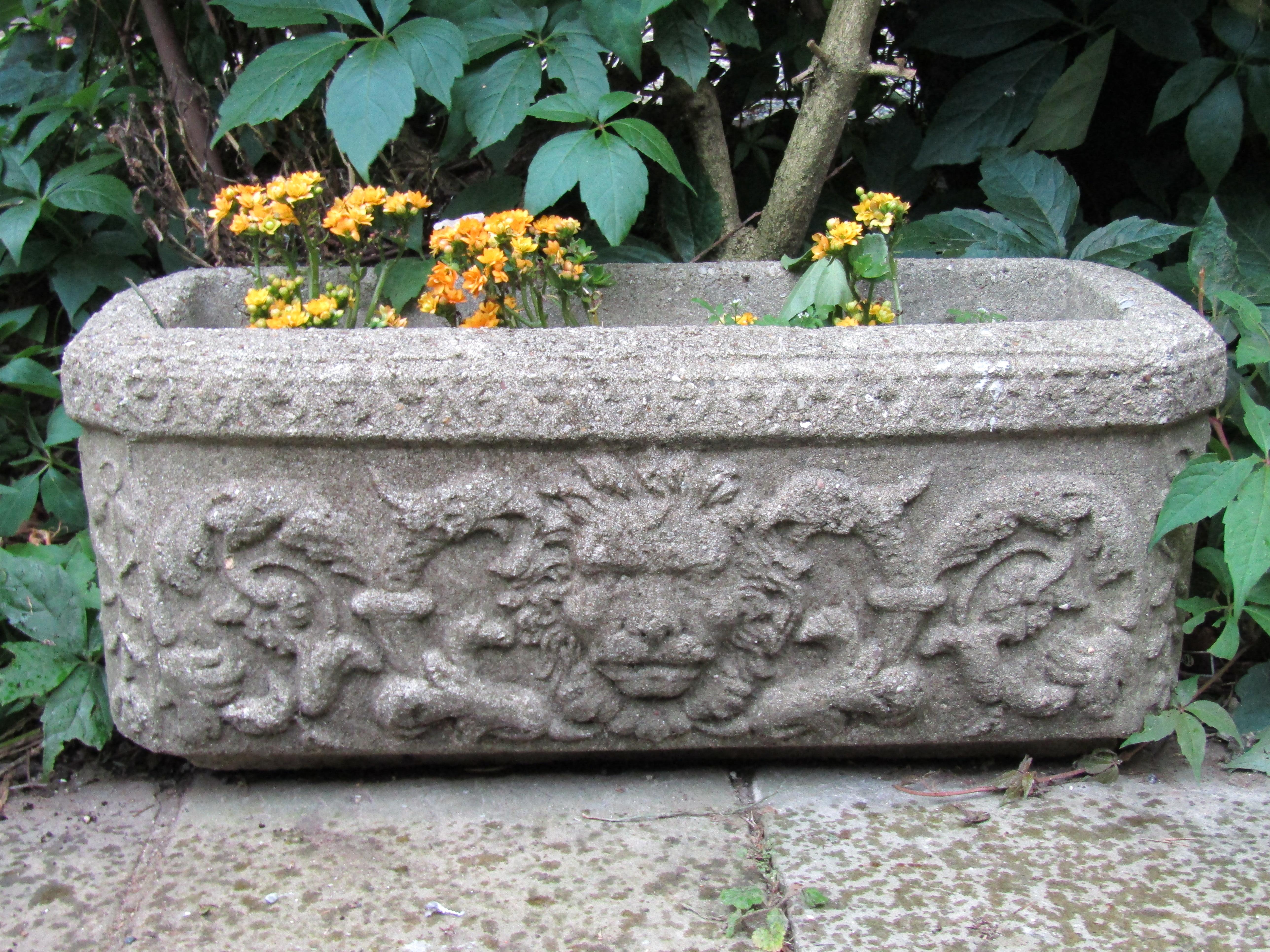 Set of 11 cast reconstituted stone garden planters troughs 1900s lion head garden feature.