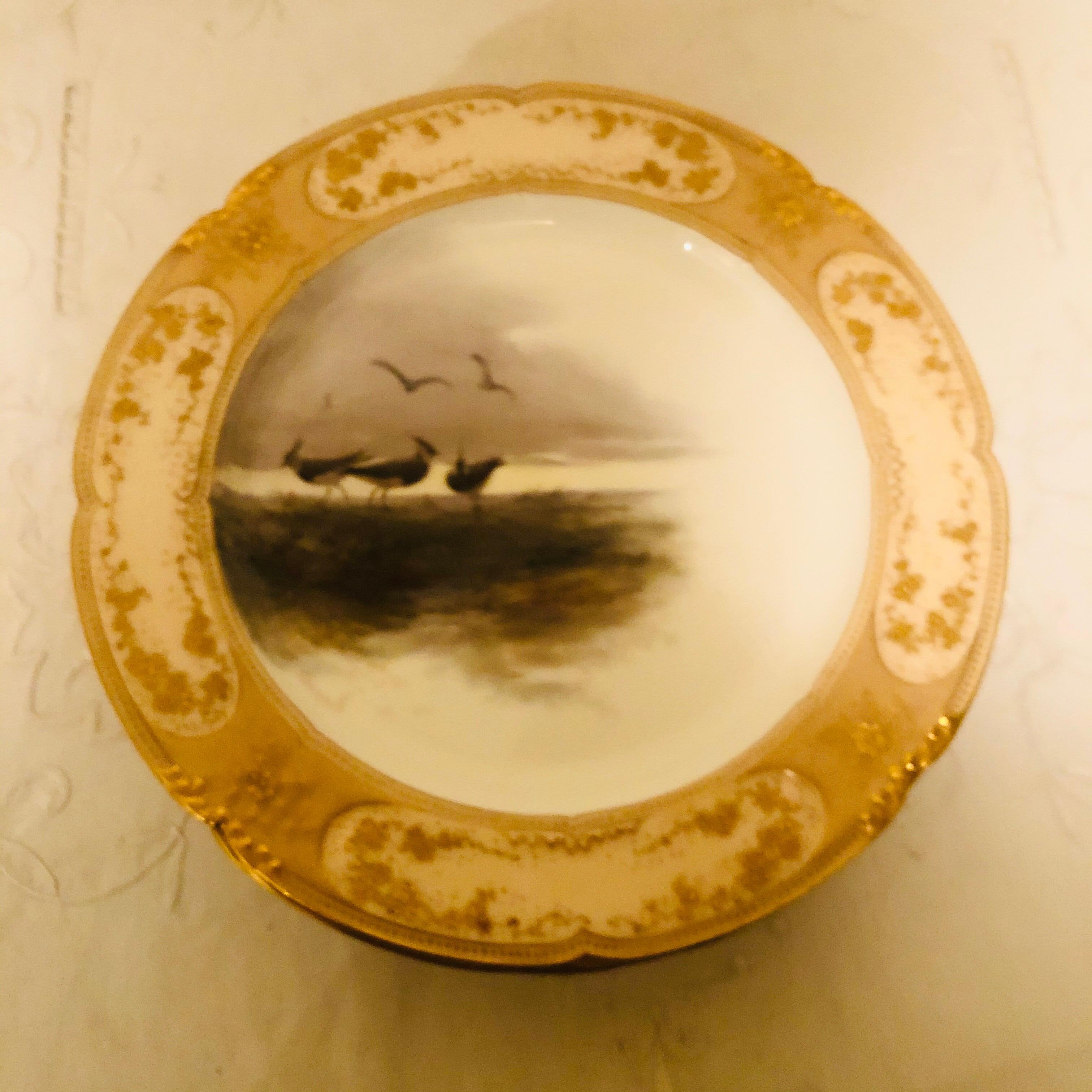 Set of 11 Doulton Burslem Bird Plates Artist Signed F. Hancock This is a Set In Good Condition In Boston, MA