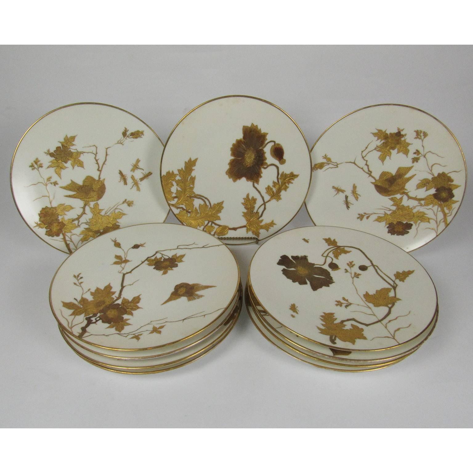 Set of 11 Fischer & Meig Pirkenhammer plates, Germany, late 19th century. Each plate with white ground and unique gilt bird and floral decoration. Measure: Diameter 9 inches.