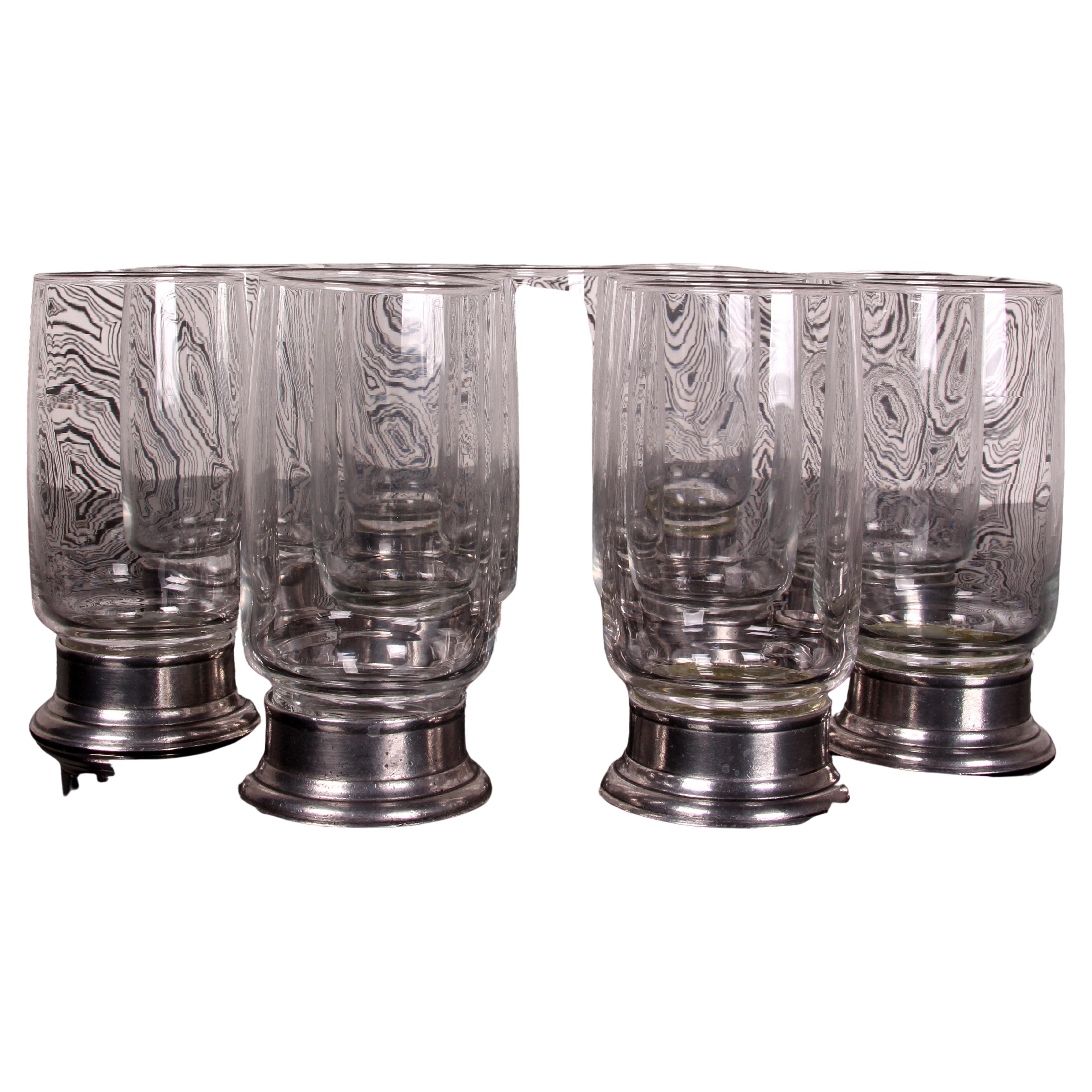 Ensemble de 11 verres à long drink / verres à highball 
Italie Base en étain 
poinçonné 

Ø 6 cm ~ hauteur : 13,5 cm ~ poids par pièce : 247grs / pièce
