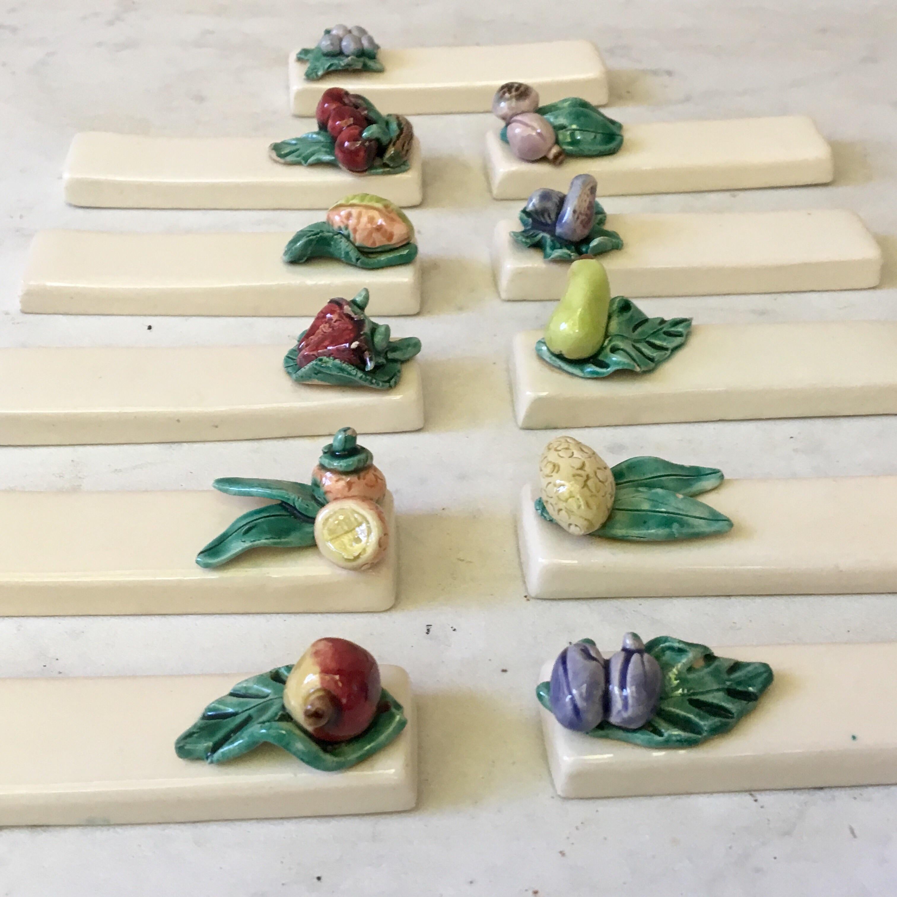Set of 11 Majolica knife rests with different fruits circa 1950 from South of France (Provence).