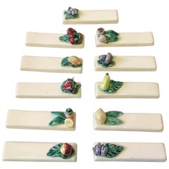 Set of 11 Majolica Knife Rests with Fruits