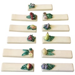 Set of 11 Majolica Knife Rests with Fruits