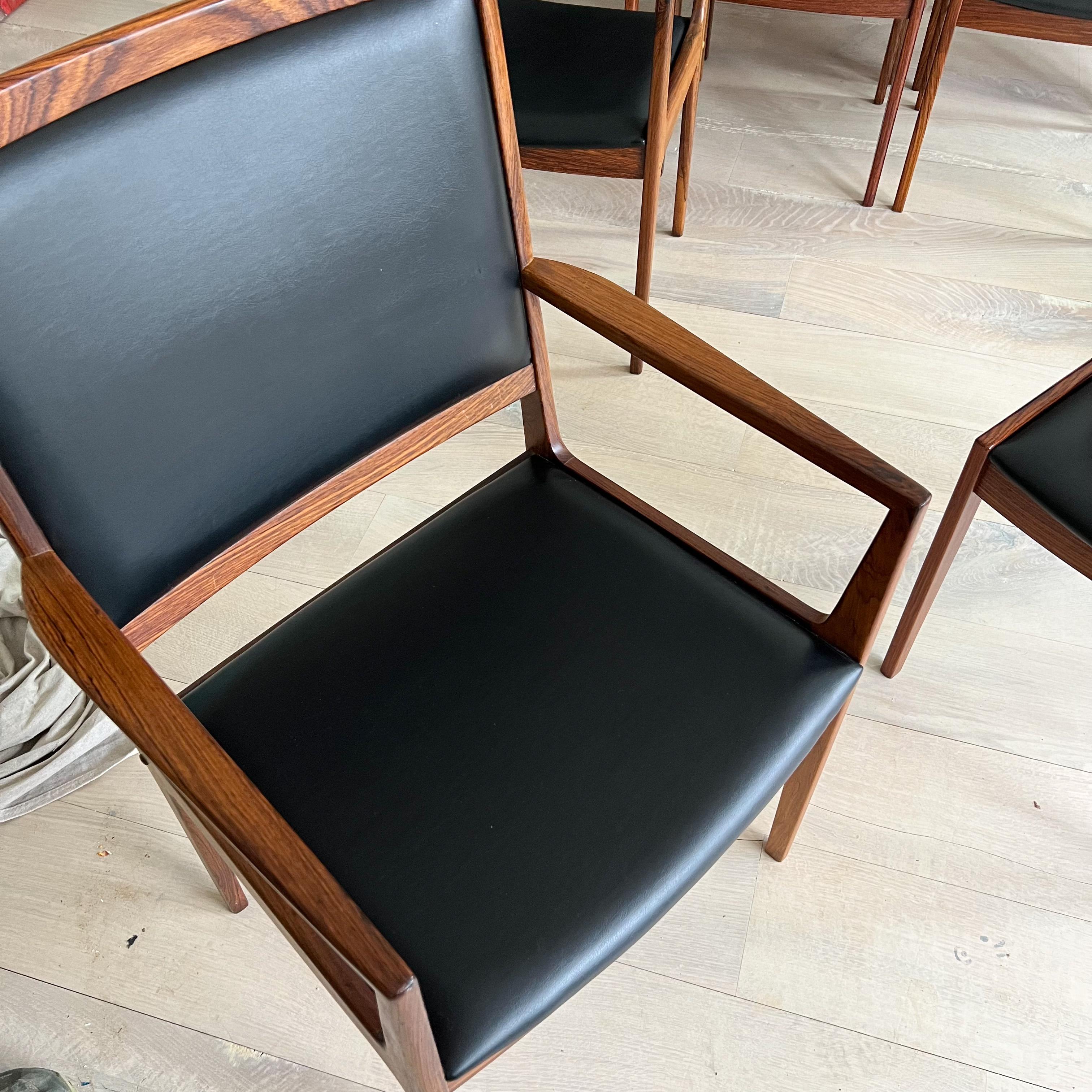 Naugahyde Set of 11 Mid Century Rosewood Dining Chairs by Kofod Larsen