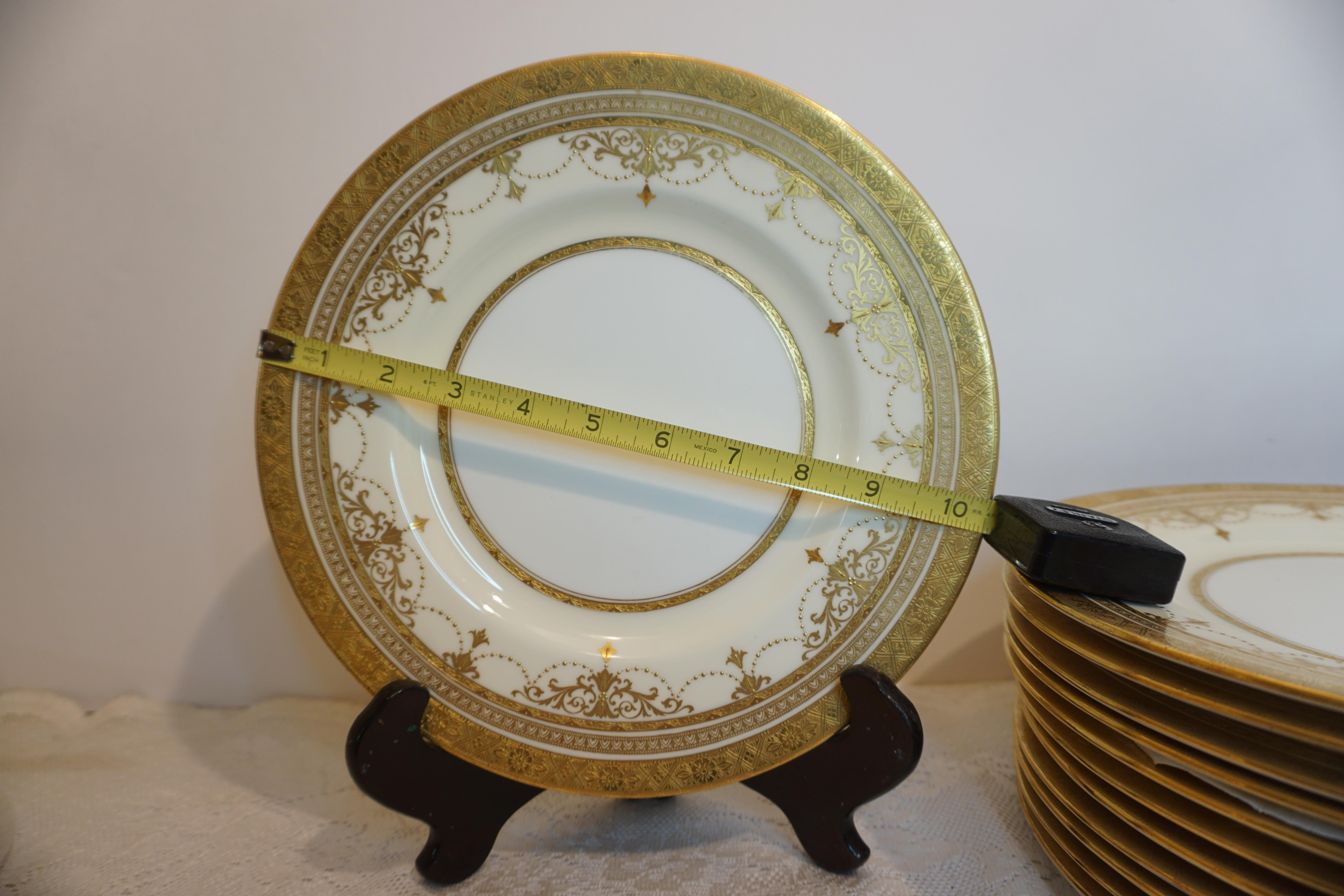 English Set of 11 Minton Dinner Plates with Raised Gold Jeweled Garlands and Gold Border For Sale