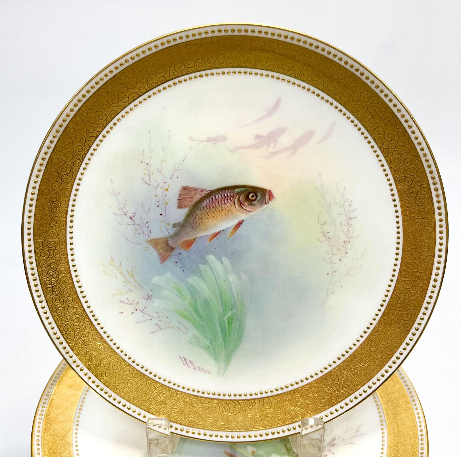 Set of 11 Minton England porcelain hand painted fish cabinet plates, circa 1905

Various hand painted fish to the central area of each plate with a gilt scrolls and beads the rim. Artist signed 