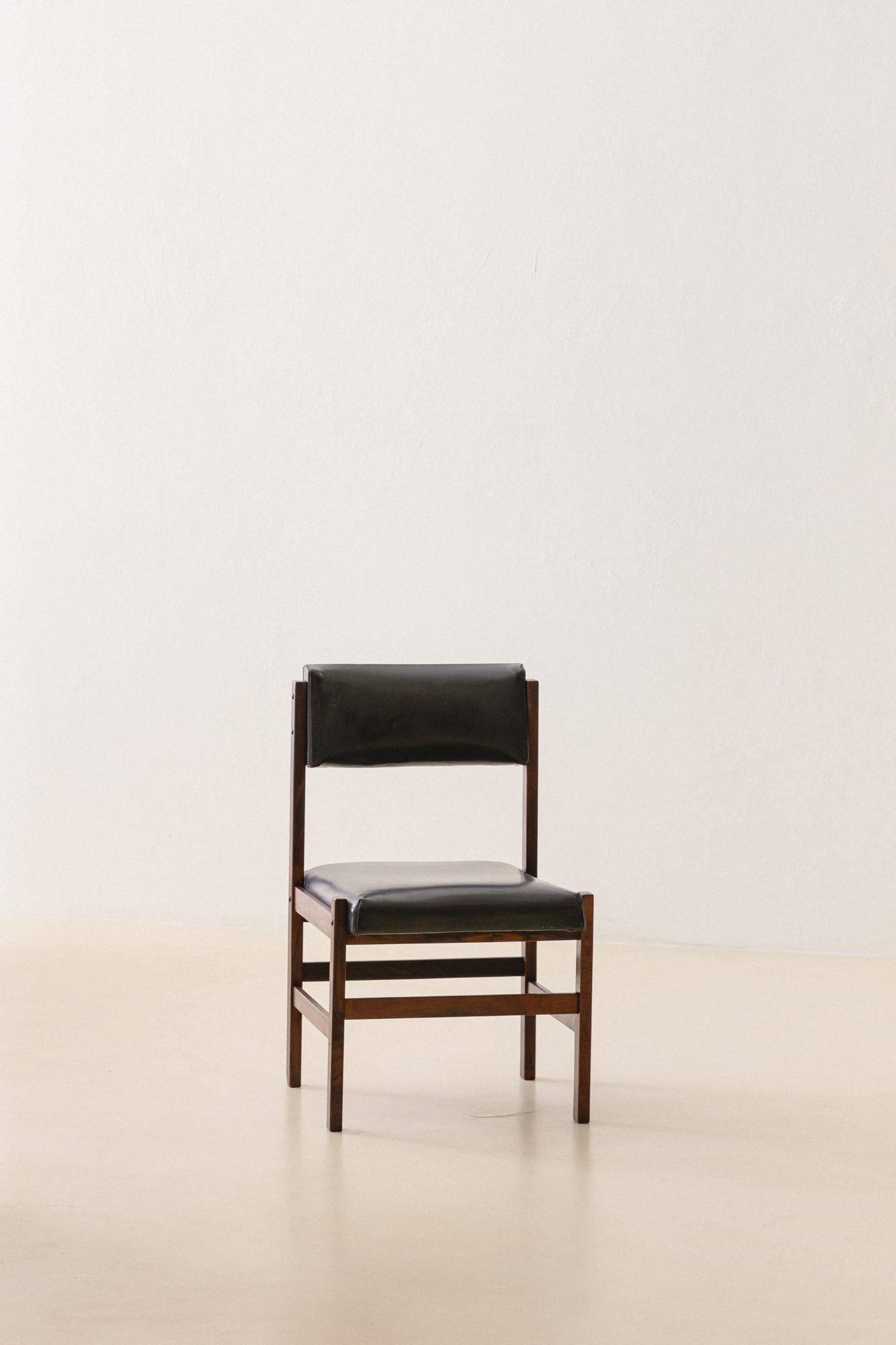 This chair is composed of solid Rosewood, with black synthetic leather seats and backrests. The set is composed of 11 chairs.

Even with authorship unidentified, these chairs are very similar with other pieces produced in the 1960s by the most