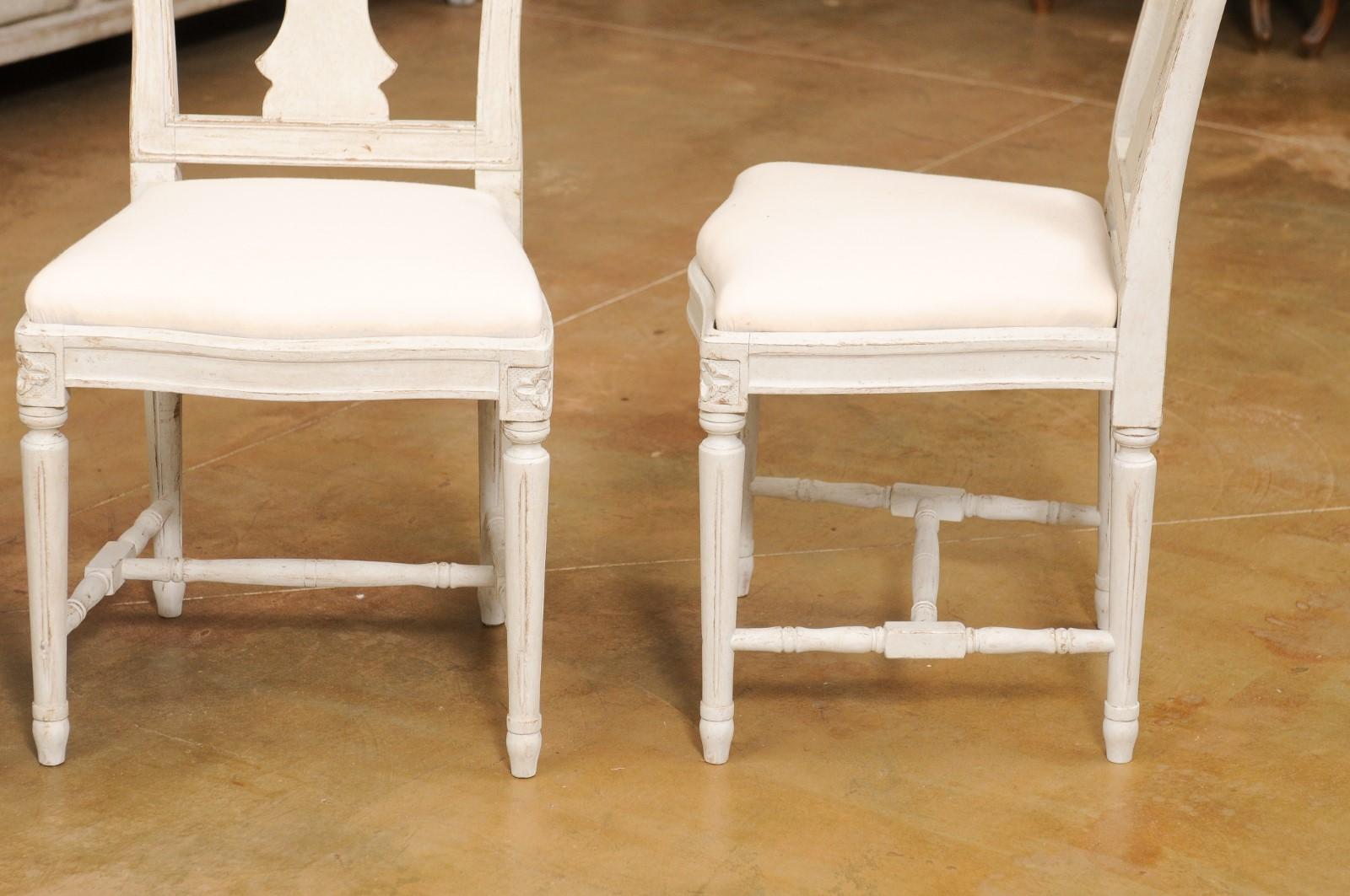 Wood Set of 11 Swedish Painted Dining Room Chairs with Carved Splats and Upholstery For Sale