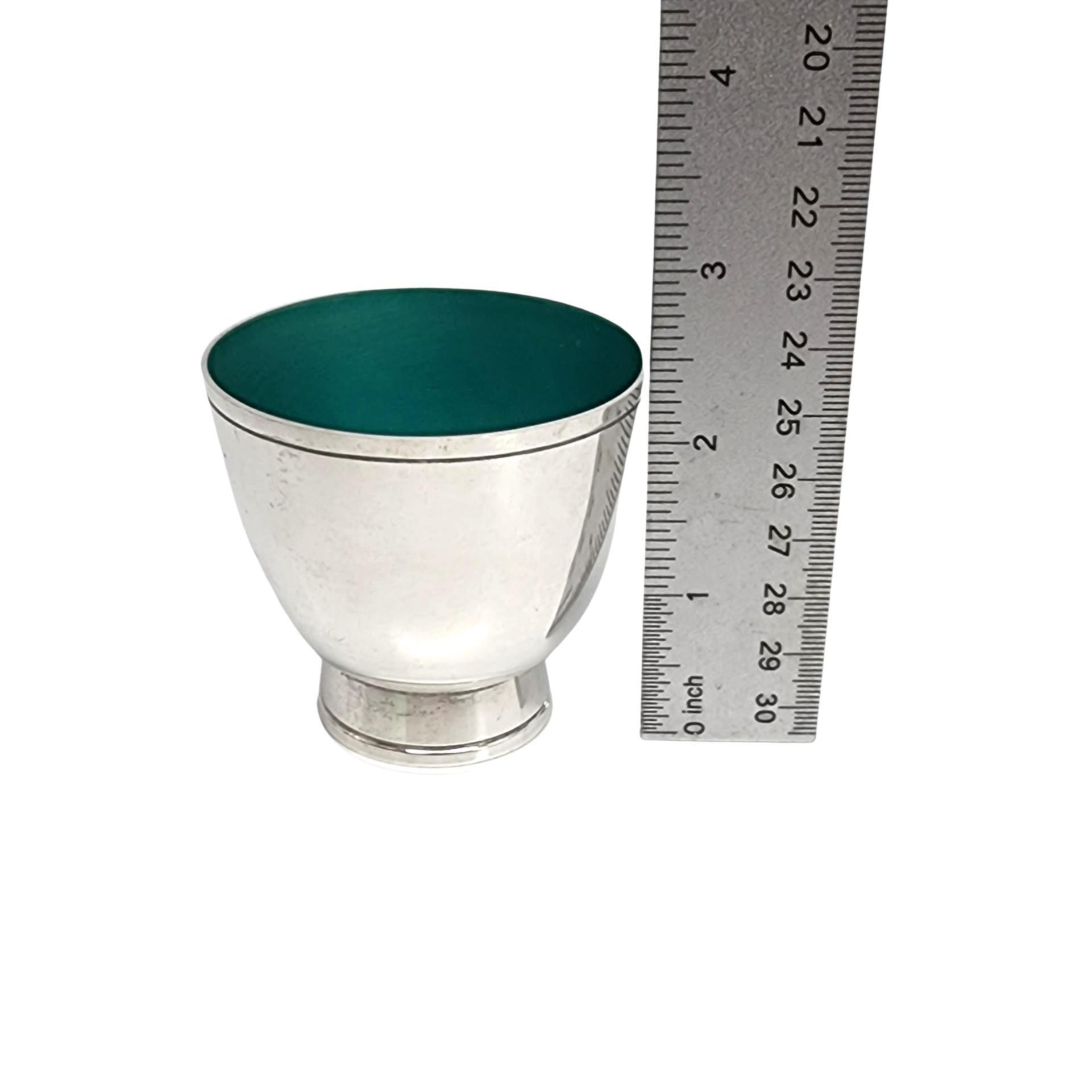 Set of 11 sterling silver and green enamel punch cups by Towle.

No monogram or engraving.

Small footed cups featuring a smooth polished finish, simple and classic line accents and vibrant green enamel interior.

Measures approx 2 5/8