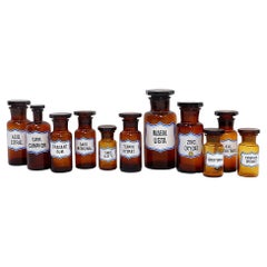 Set of 11 vintage amber glass pharmacy bottles collection