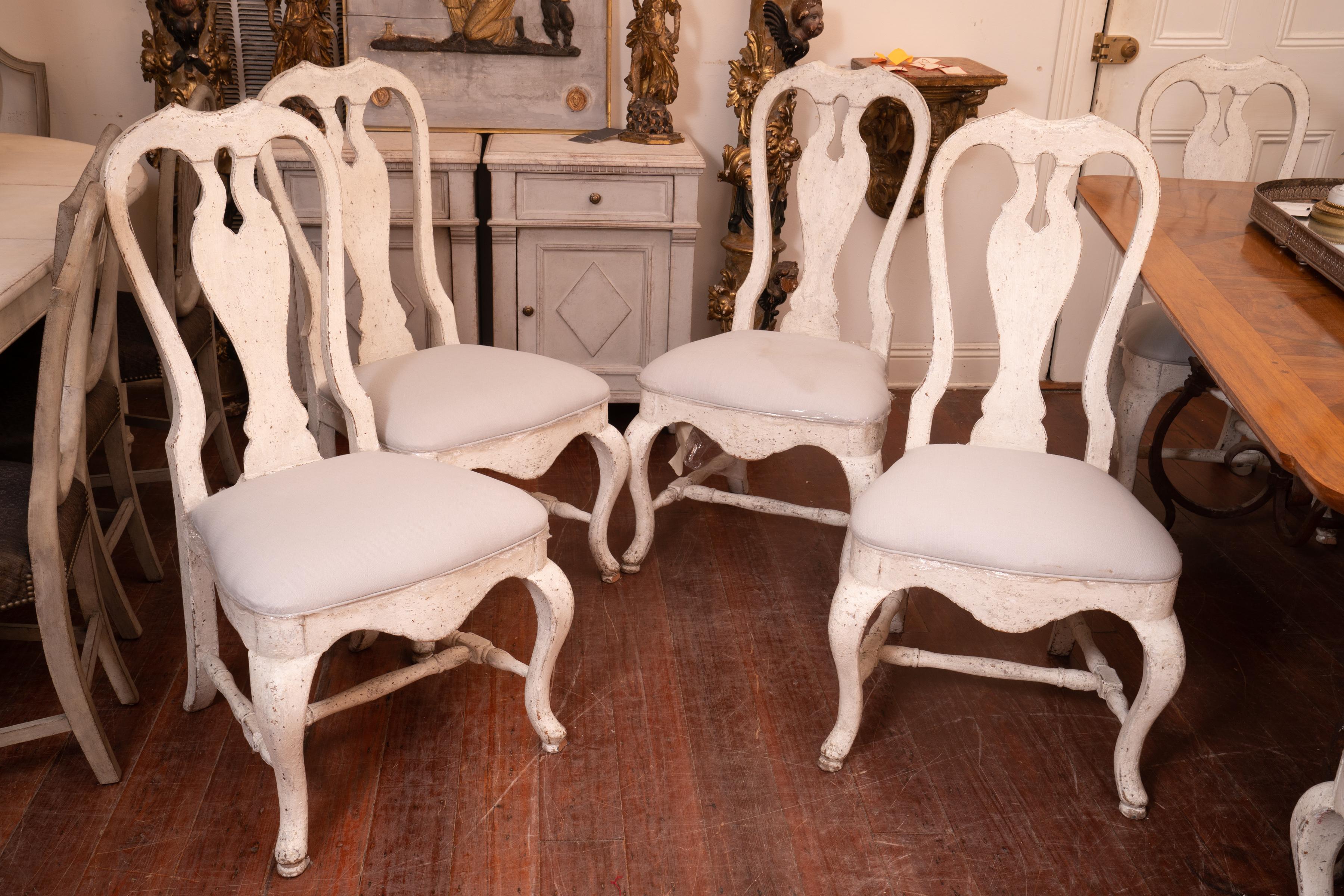 A set of 12 19th century Swedish design dining chairs. The chairs are very sturdy and comfortable.