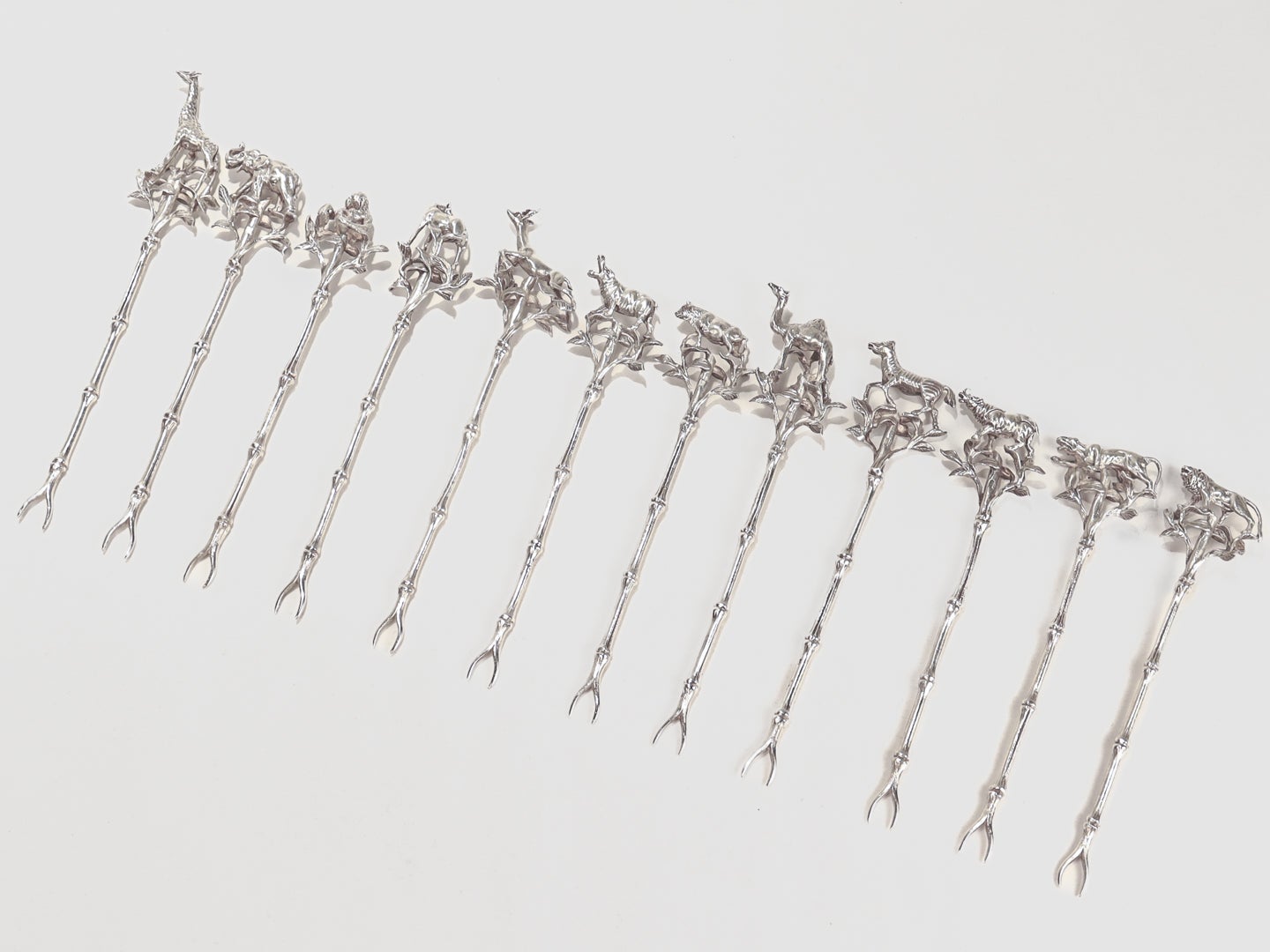 20th Century Set of 12 African Safari-Themed Sterling Silver Cocktail Picks with Animals For Sale