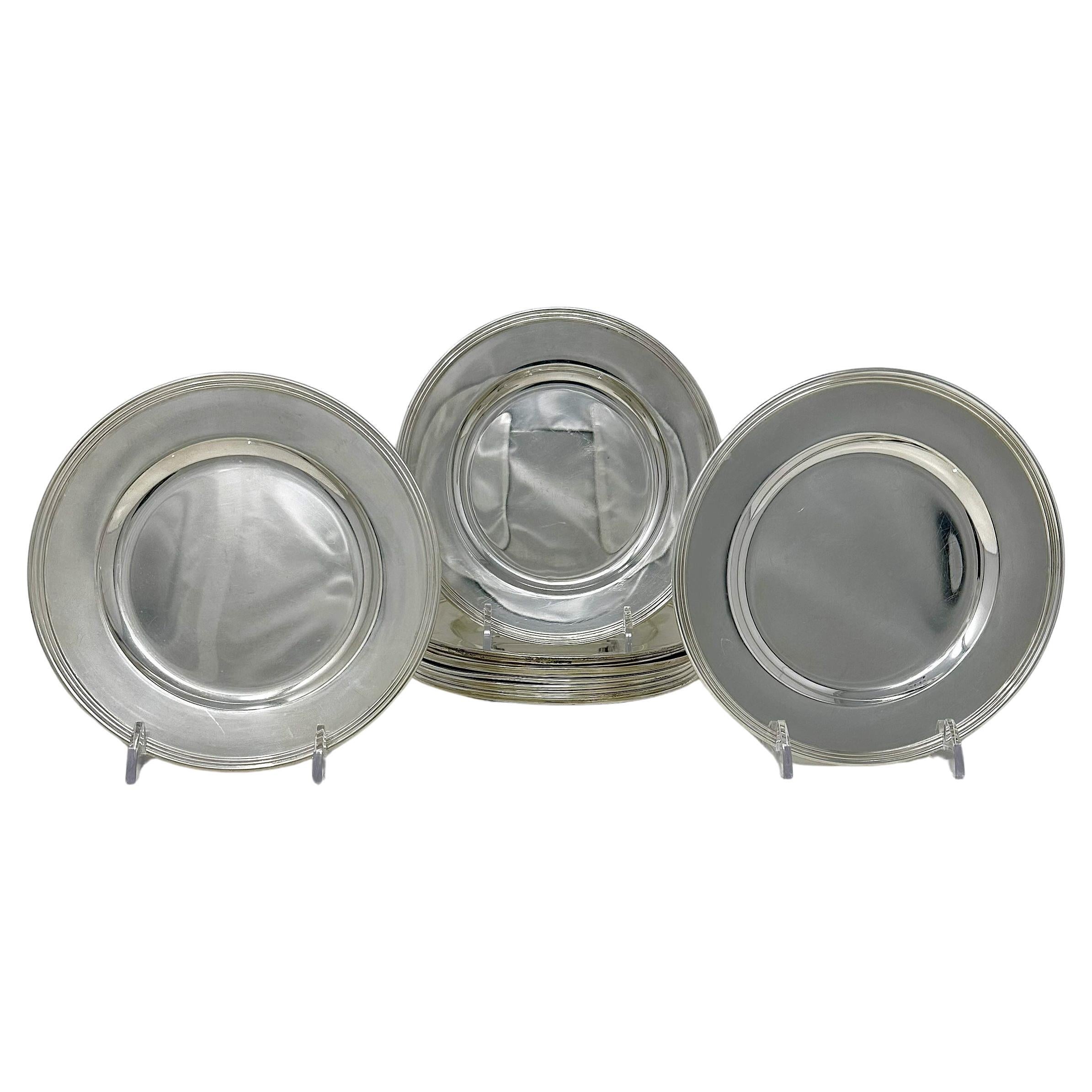 Juego de 12 antiguos platos de pan de plata de ley americana con el sello 