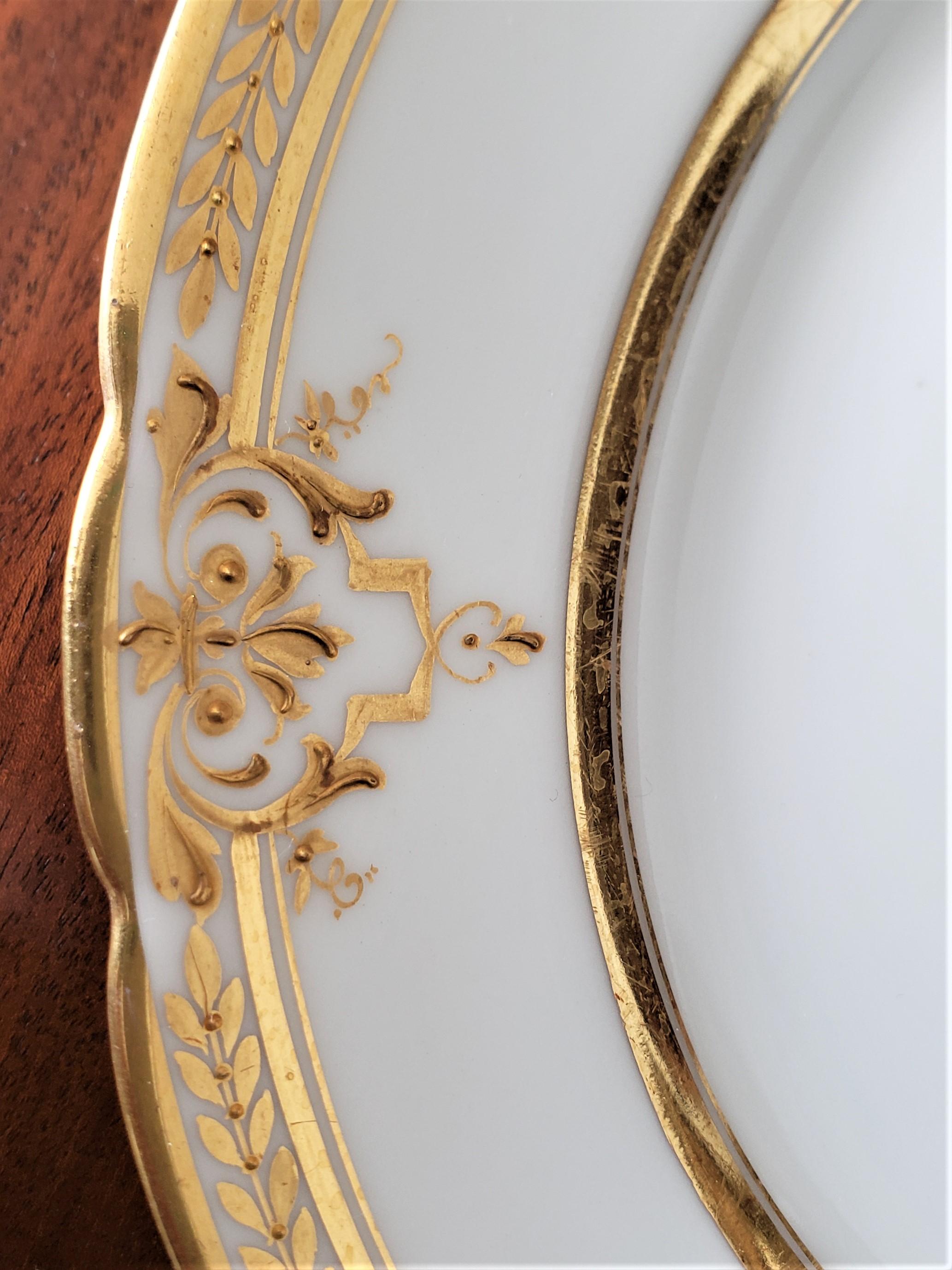 Rococo Revival Set of 12 Antique Dresden White Porcelain Dinner Plates with Gilt Decoration For Sale