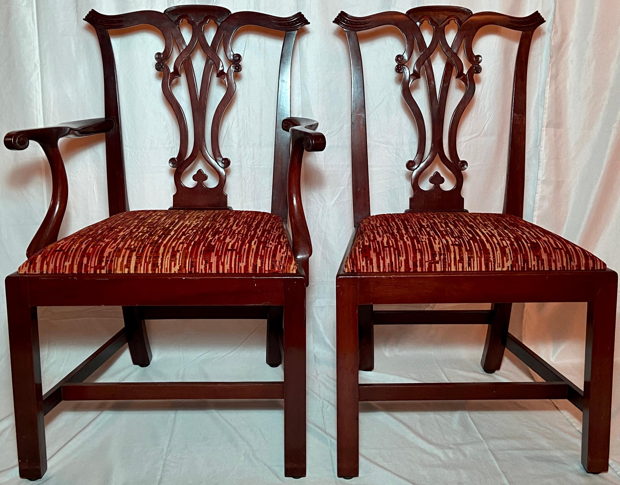 Set of 12 Antique English Mahogany Chippendale Chairs, Circa 1900.  
2 Armchairs and 10 Sidechairs, all newly upholstered.