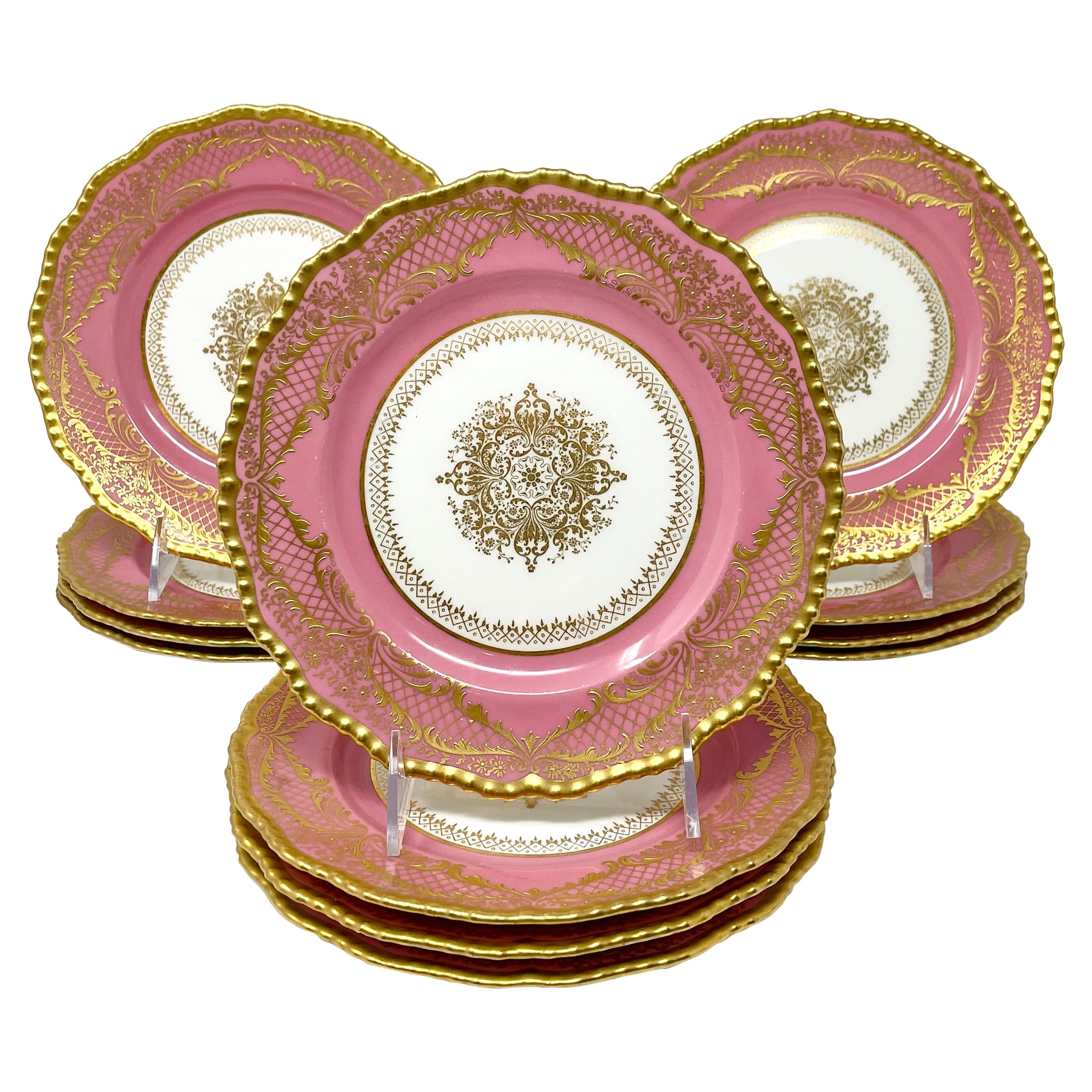 Set di 12 antichi piatti da dessert in porcellana rosa e oro di Royal Doulton.