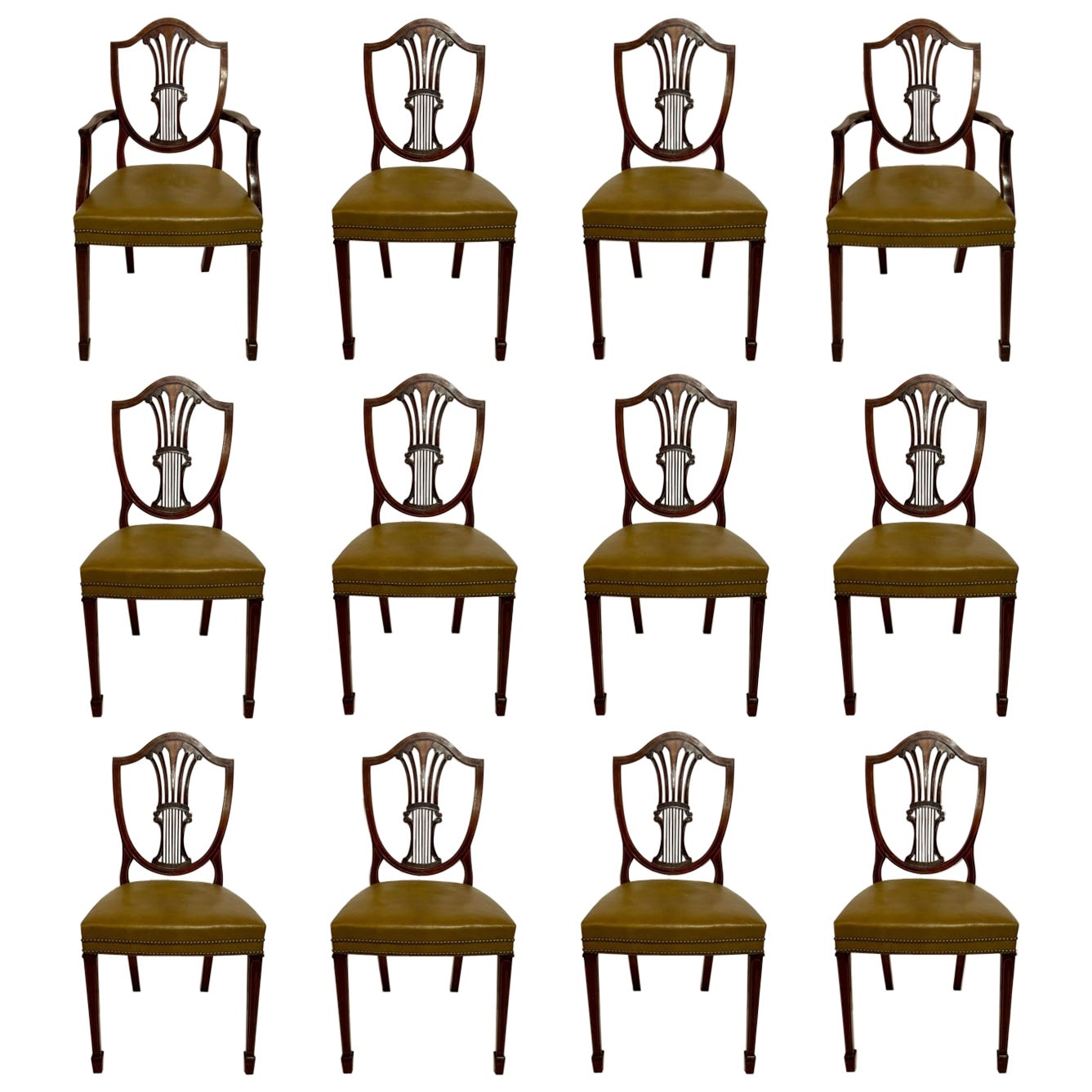 Juego de 12 Sillas de Comedor Sheraton Inglesas Antiguas de Caoba y Cuero Circa Años 1920 en venta