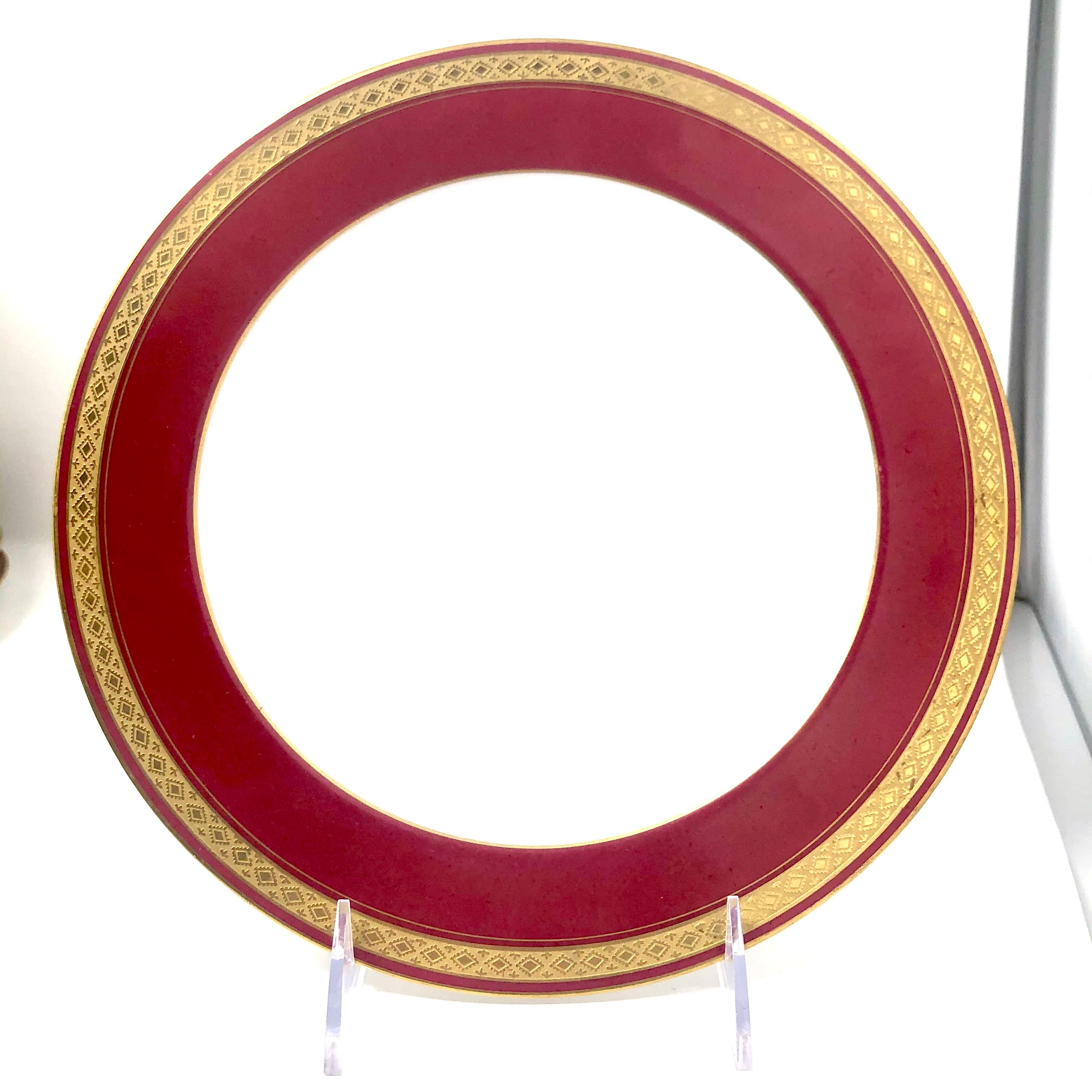 Set of 12 antique French Haviland Limoges raspberry red service dinner plates, circa 1890-1910.