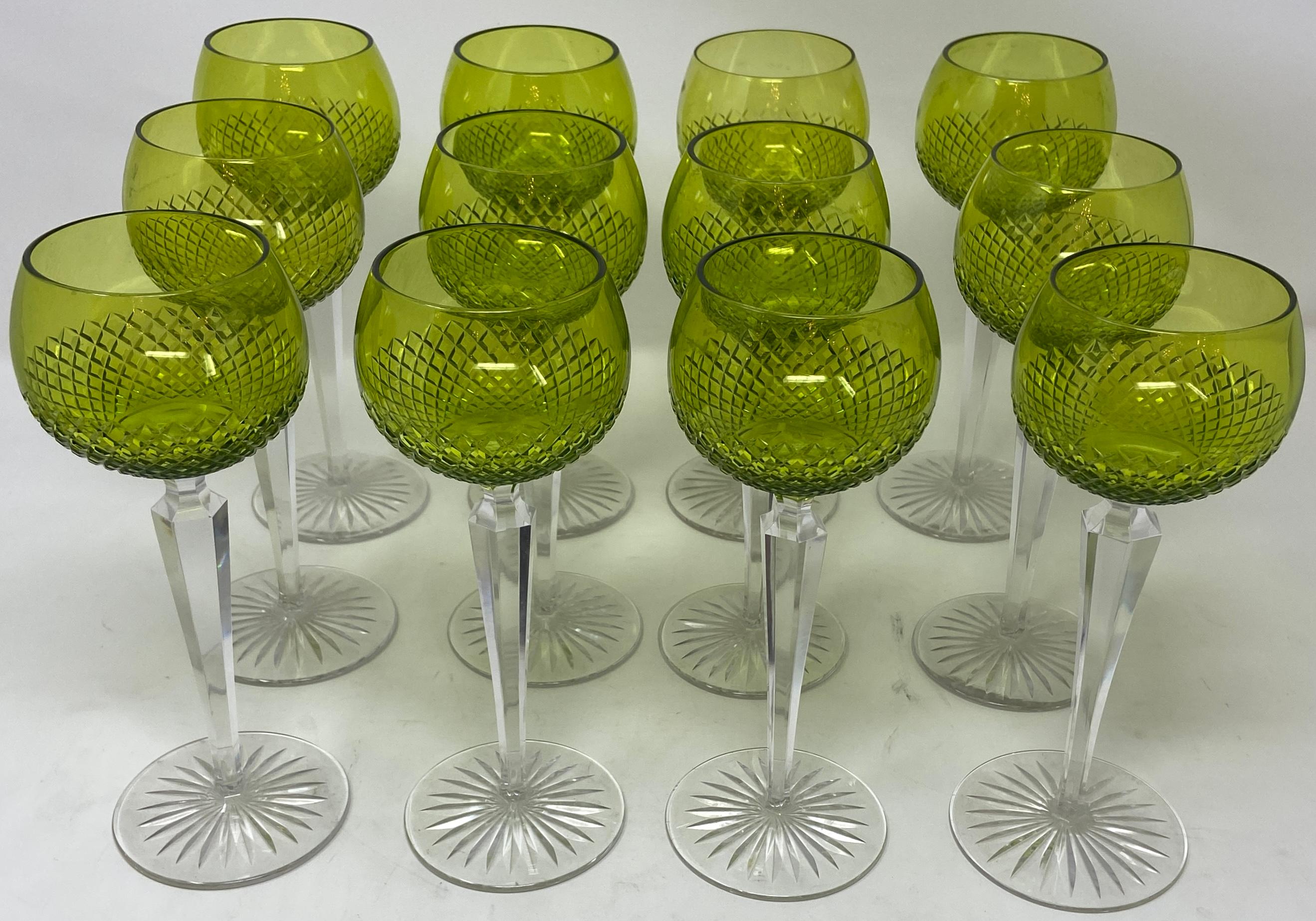 Set of 12 antique German cut crystal chartreuse-colored with clear stem Rhine wine glasses, Circa 1900.