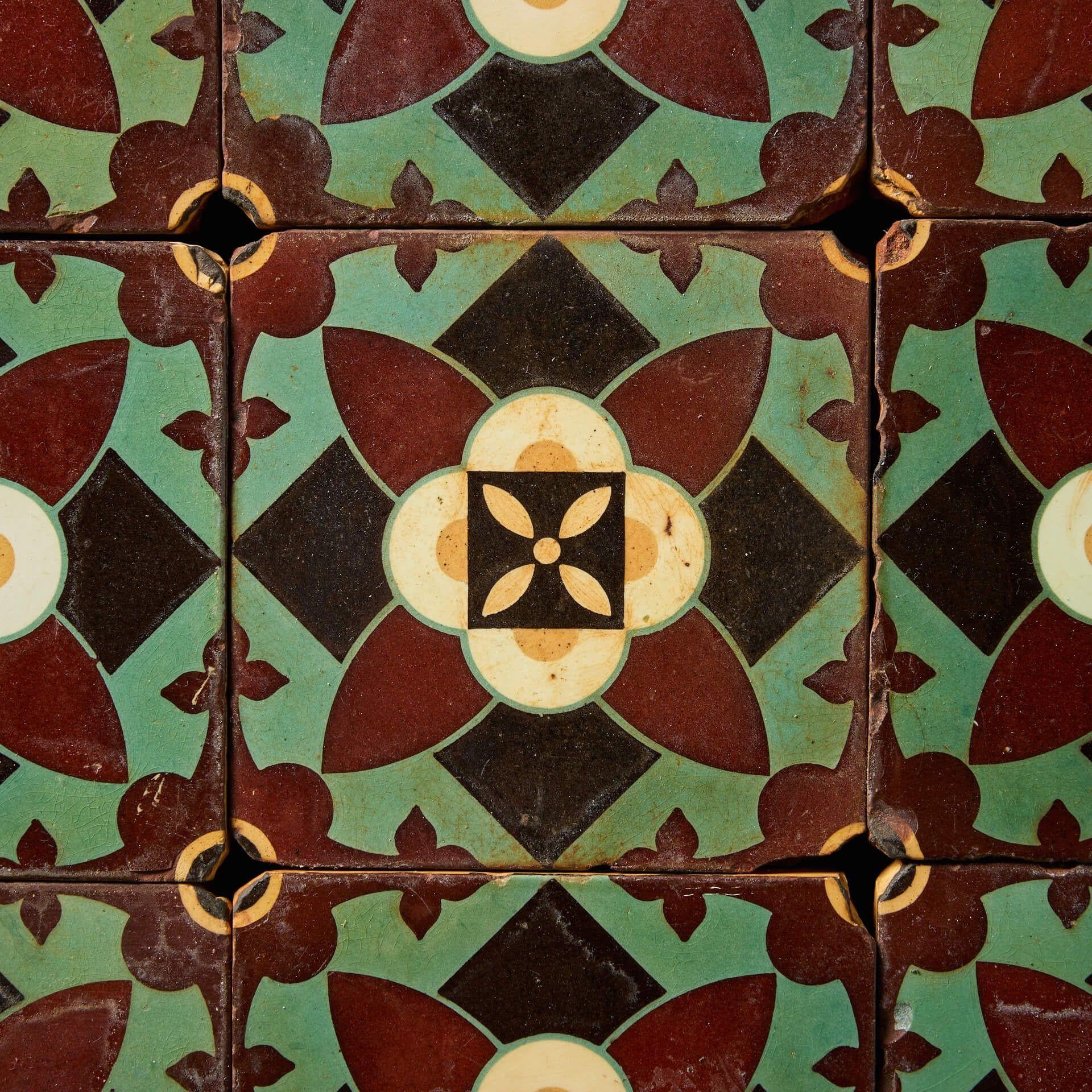 Set of 12 Antique Glazed Encaustic Floral Tiles by Minton In Fair Condition For Sale In Wormelow, Herefordshire