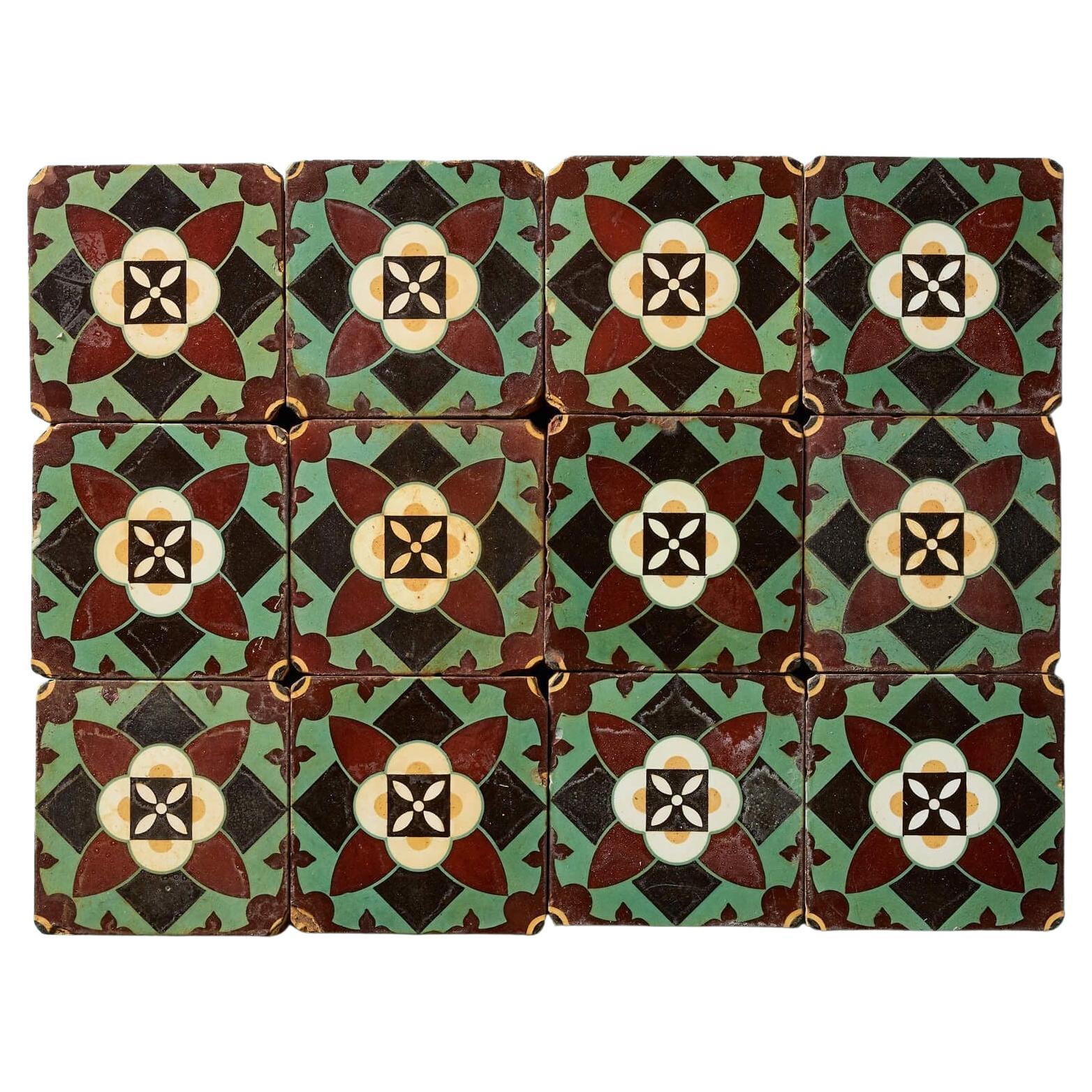 Set of 12 Antique Glazed Encaustic Floral Tiles by Minton For Sale