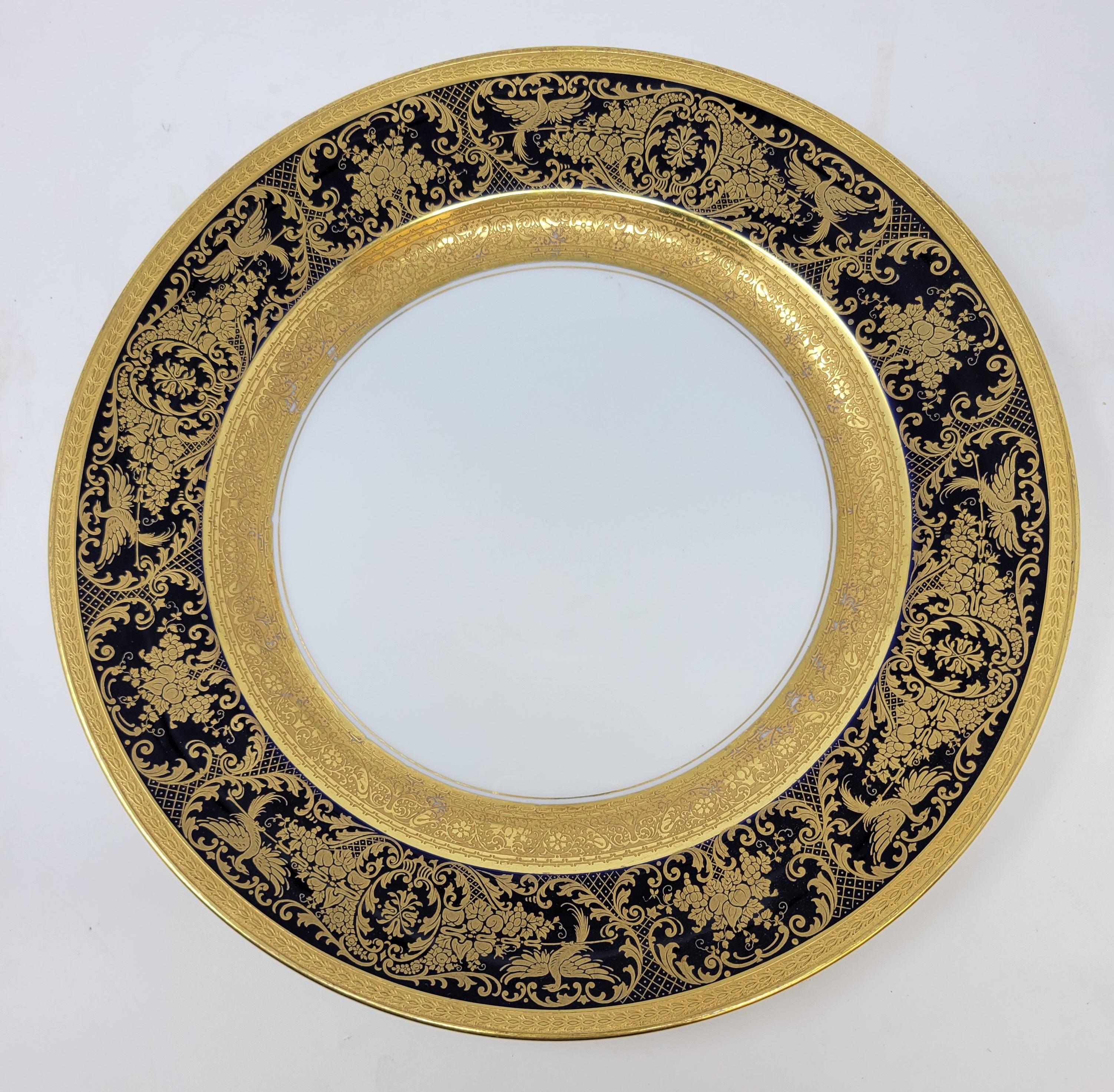 These dining plates with their rich blue color and fine gold detail will add to any table setting for a happy occasion.