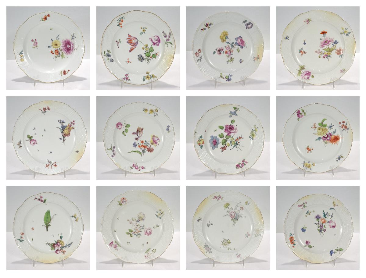A fine set of 12 antique, 18th century German porcelain plates.

By the Meissen Porcelain Manufactory. 

In the Old Ozier pattern.

Each plate has a gilt and slightly scalloped ring and is decorated with handpainted floral devices. 

Simply a great