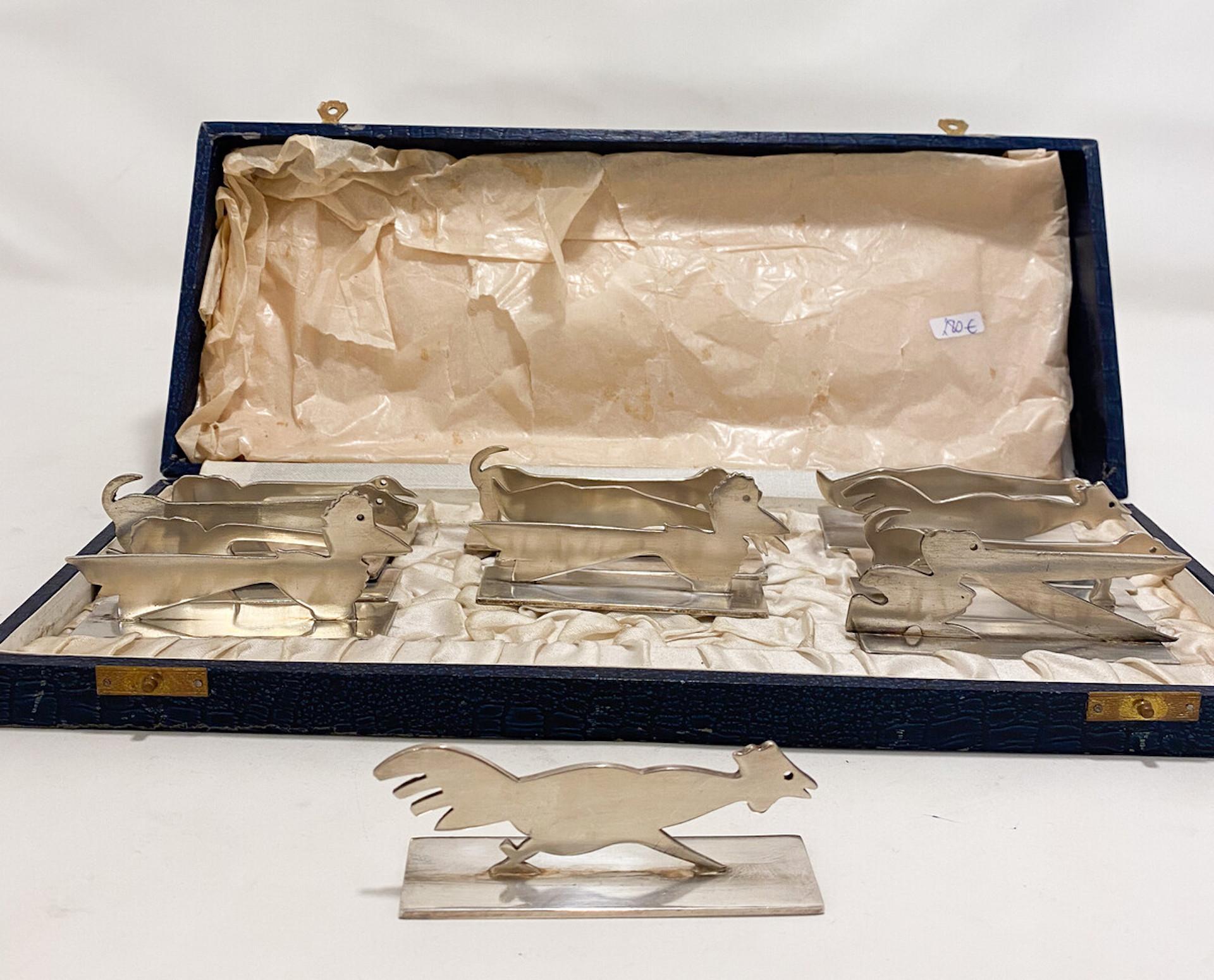 Ensemble de 12 porte-couteaux art déco en argent animaux par Yorel, années 1930

