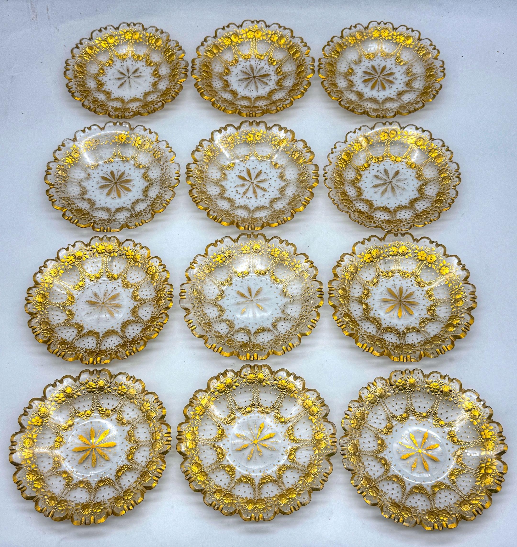 Set of 12 Belle Époque Cut Glass and Gilt Dessert Plates, circa 1890–1910
6.5 in. diameter x 0.75 in. high

A superb matched service of twelve hand-cut and richly gilded glass dessert plates, dating to the late 19th or early 20th century. Each plate