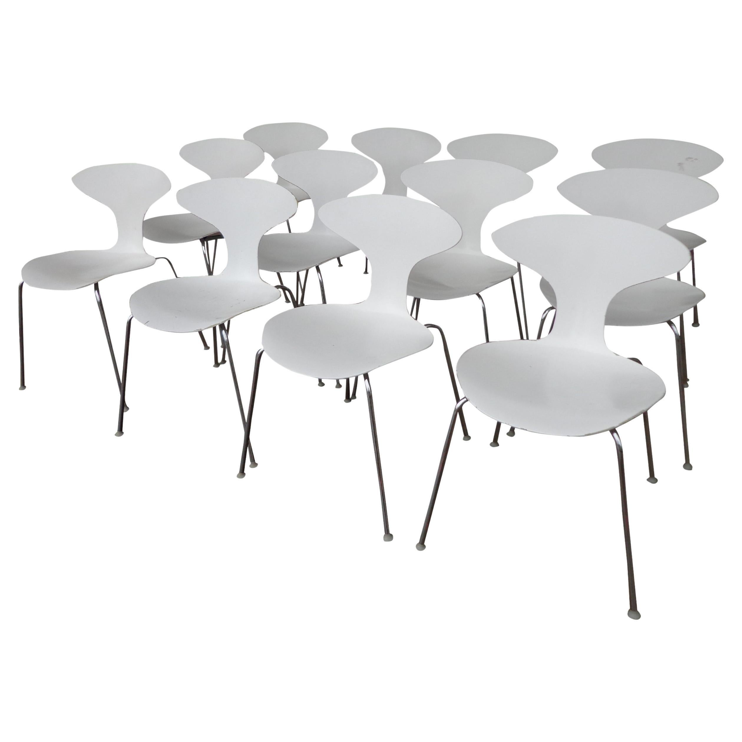 Set of 12 Bernhardt orbit side chairs by Russ Lovegrove

Building upon classic designs by Charles Eames, Arne Jacobsen and Norman Cherner, Ross Lovegrove created the sensual, organic and sculptural Orbit stacking chair that can be dressed up with
