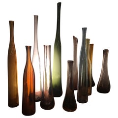 Set of 12 Blown Bottles by Claude Morin