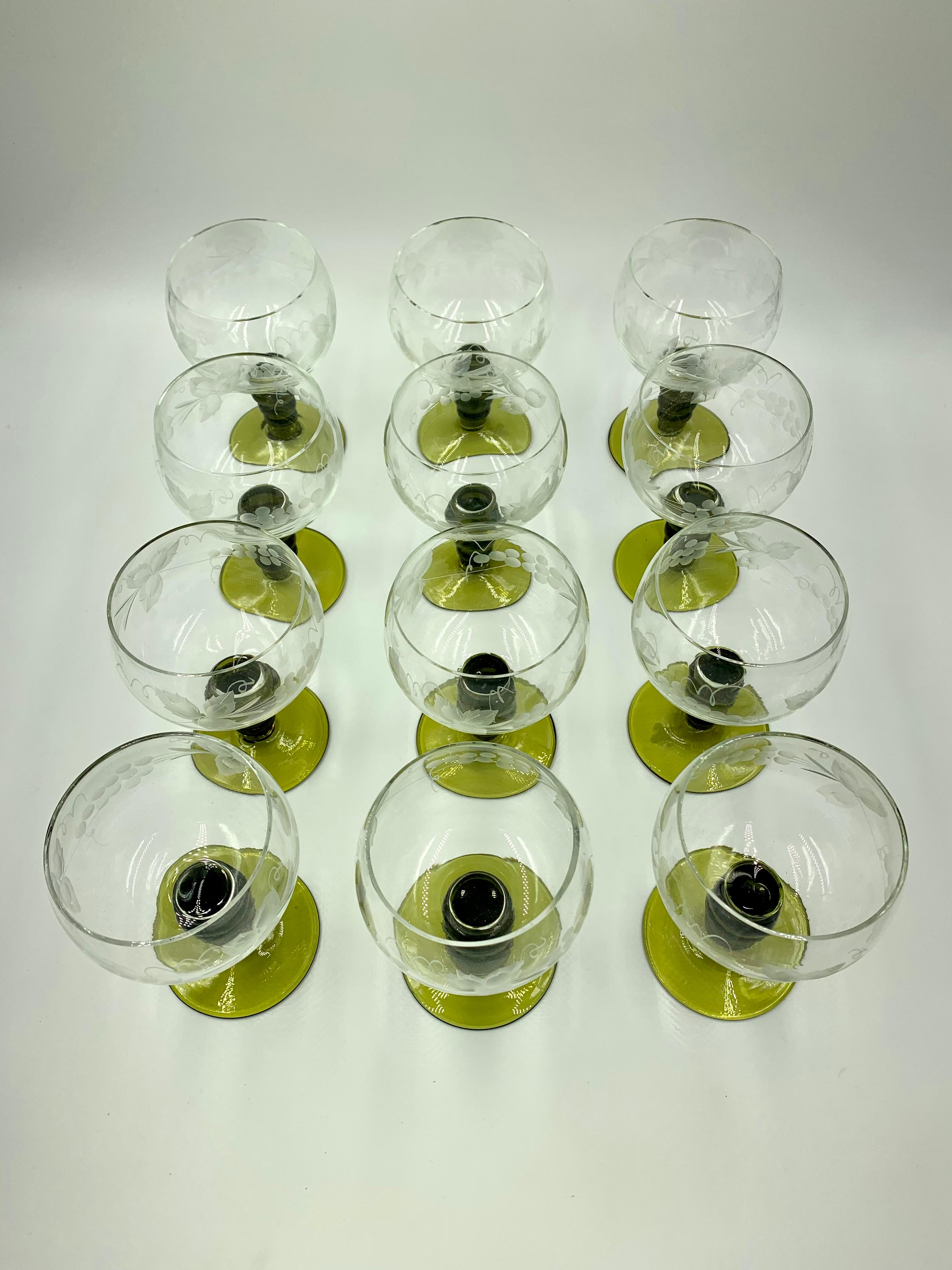 Set of 12 Bohemian Rhine Wine Glasses, Engraved Grapevine motif with Green Stem In Good Condition For Sale In New York, NY