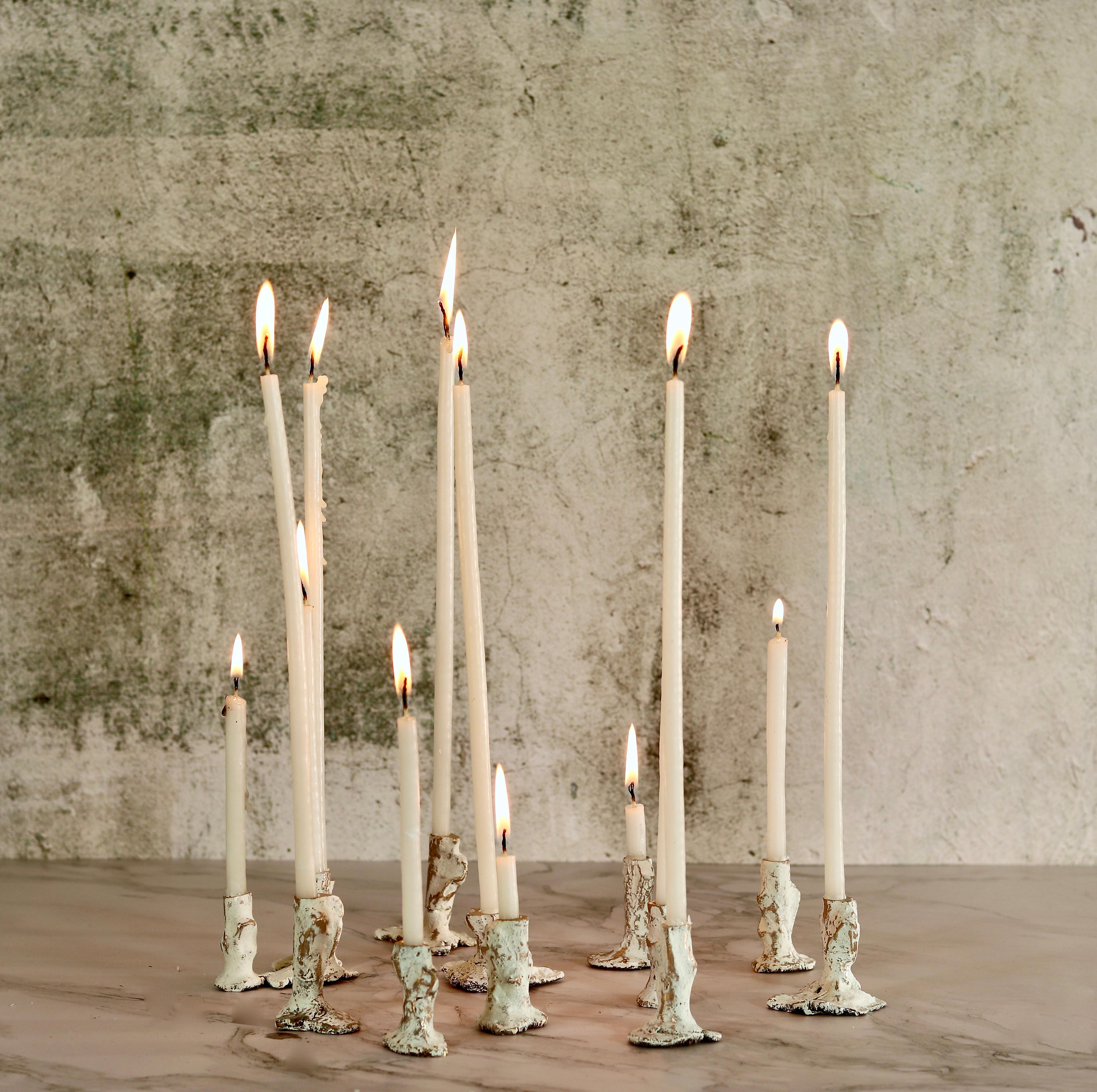 Post-Modern Set of 12 Bronze Candleholders by Samuel Costantini For Sale